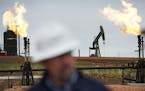 North Dakota oil and natural gas production in May were relatively flat. (Richard Tsong-Taatarii/Minneapolis Star Tribune)