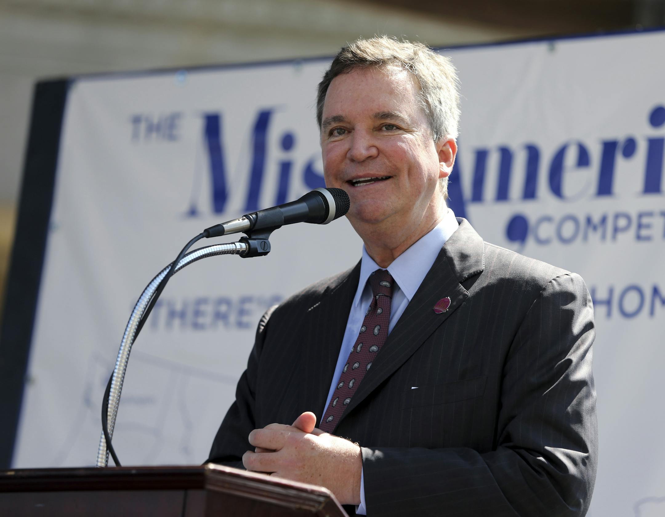 FILE- In this Aug. 30, 2016, file photo, Sam Haskell, left, CEO of Miss America Organization, speaks during Miss America Pageant arrival ceremonies in Atlantic City, N.J. On Thursday Dec. 21, 2017, the Huffington Post published emails it obtained that show Haskell and others from the Miss America Organization commenting harshly on past winners' appearance, intellect and sex lives. Dick Clark Productions, the pageant's TV production partner, severed ties with the Miss America Organization over th