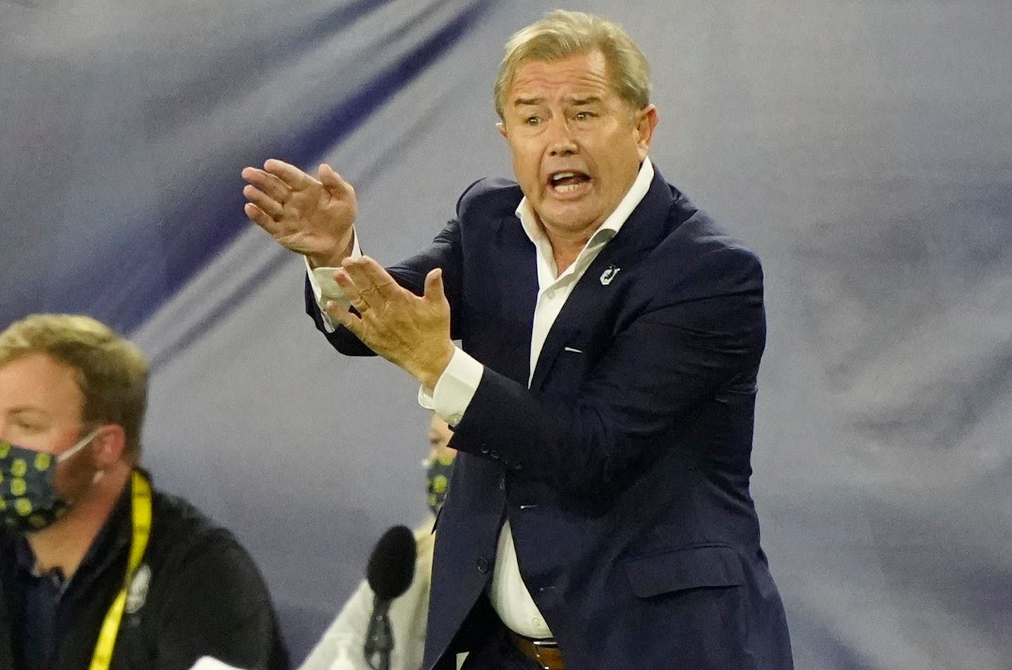 Minnesota United head coach Adrian Heath watches the action during the first half of an MLS soccer match against Nashville SC Tuesday, Oct. 6, 2020, in Nashville, Tenn. (AP Photo/Mark Humphrey)