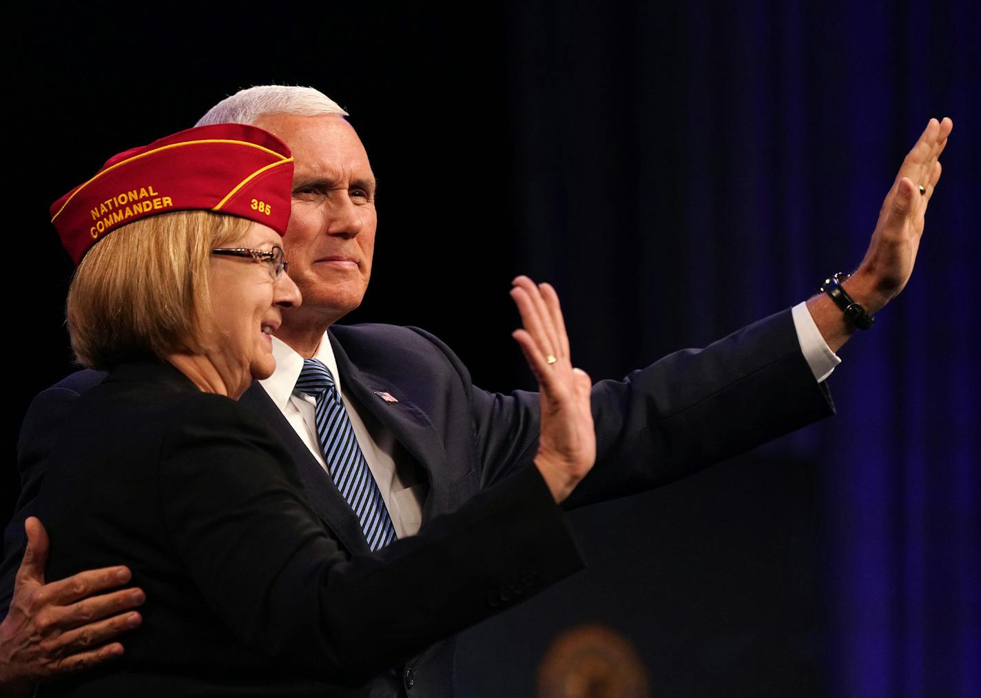 Vice President Mike Pence waved along with outgoing national commander of the National Legion Denise Rohan to attendees of the American Legion National Convention before he spoke Thursday. ] ANTHONY SOUFFLE &#xef; anthony.souffle@startribune.com Vice President Mike Pence addressed the American Legion National Convention Thursday, Aug. 30, 2018 at the Minneapolis Convention Center in Minneapolis.