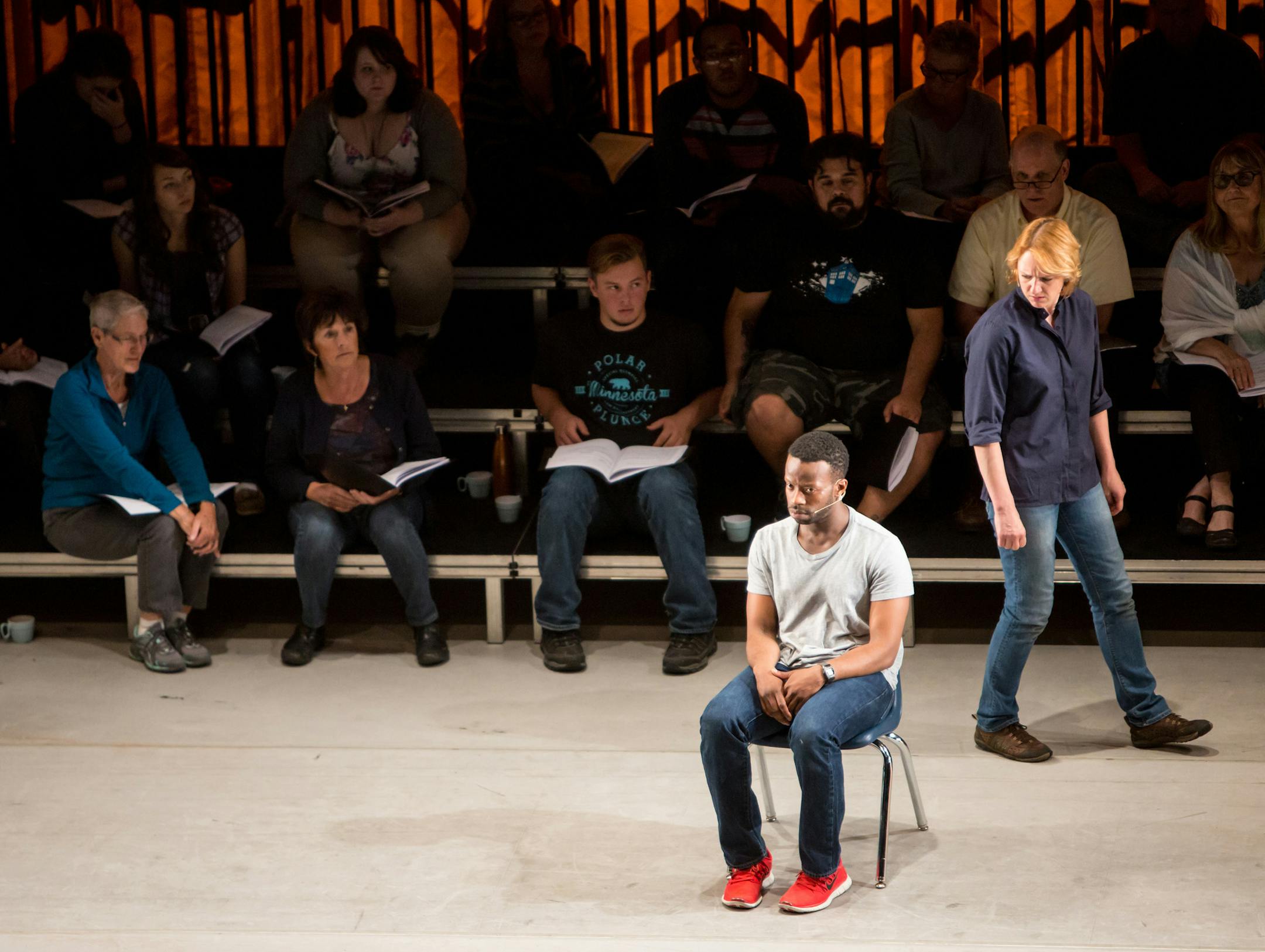 Clifford Samuel and Lesley Hart with Anoka-Ramsey Community College music and theater students and members of the Edina Community Lutheran Choir in the Guthrie Theater's WorldStage Series presentation of the Actors Touring Company production of The Events, written by David Greig, and directed by Ramin Gray, with music by John Browne. September 30 - November 1, 2015 on the McGuire Proscenium Stage at the Guthrie Theater, Minneapolis. Photo by Dan Norman.