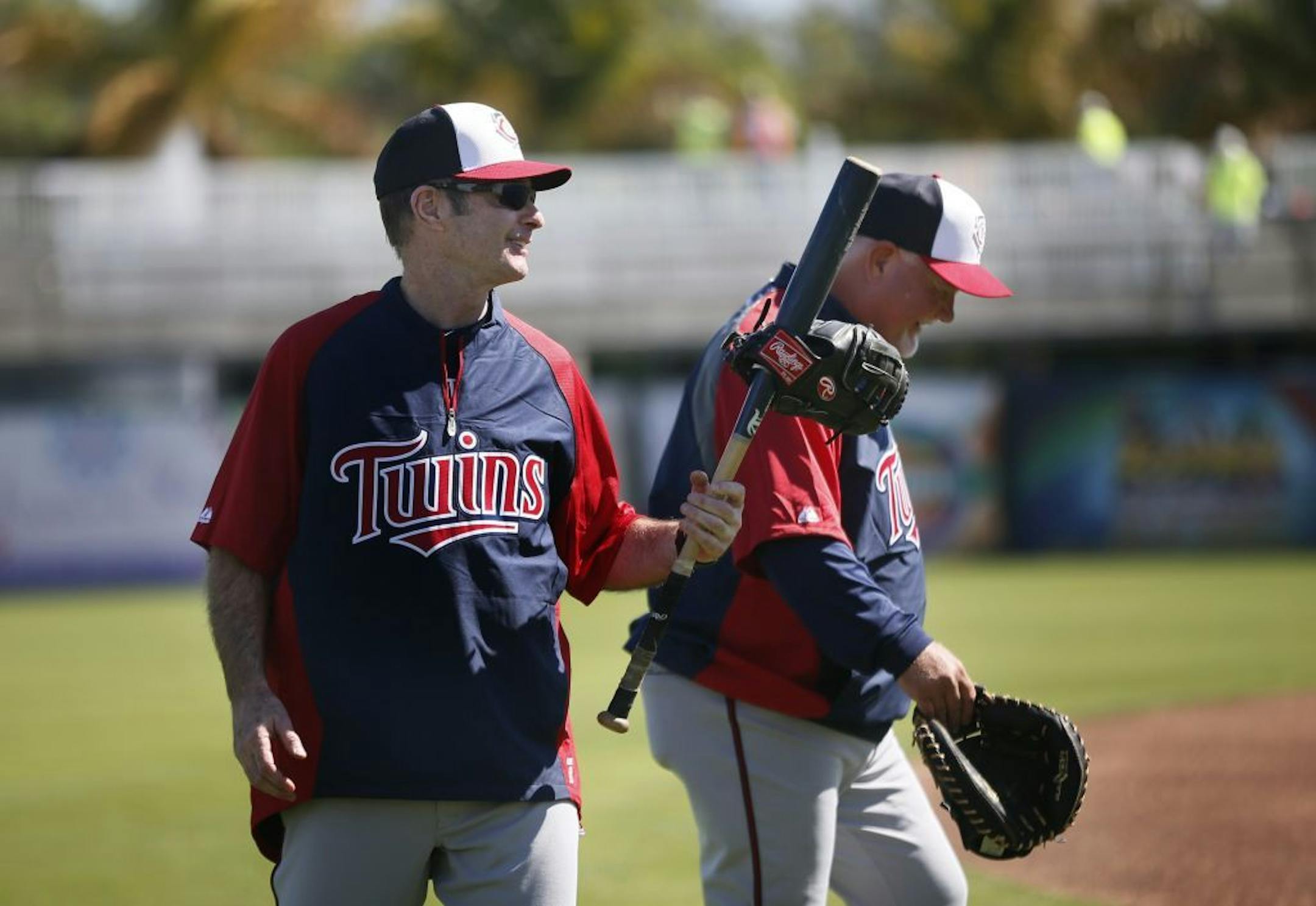 Twins coach Paul Molitor left and manger Ron Gardenhire shared a laugh after the first day of spring training Monday Feb 17. 2014 in Fort Myers, Florida Lee County Sports Complex. Monday is the first full day workout with pitchers and catchers .