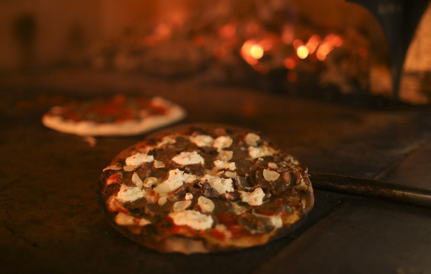 A pizza came out of the oven at Black Sheep Coal Fired Pizza in the MSP Mall in the Lindbergh Terminal. ] JEFF WHEELER &#x2022; jeff.wheeler@startribune.com The MSP airport is home to loads of new shops and restaurants that are the result of the current refresh of the Lindbergh Terminal. Several were photographed Tuesday afternoon, August 22, 2017 in Minneapolis.