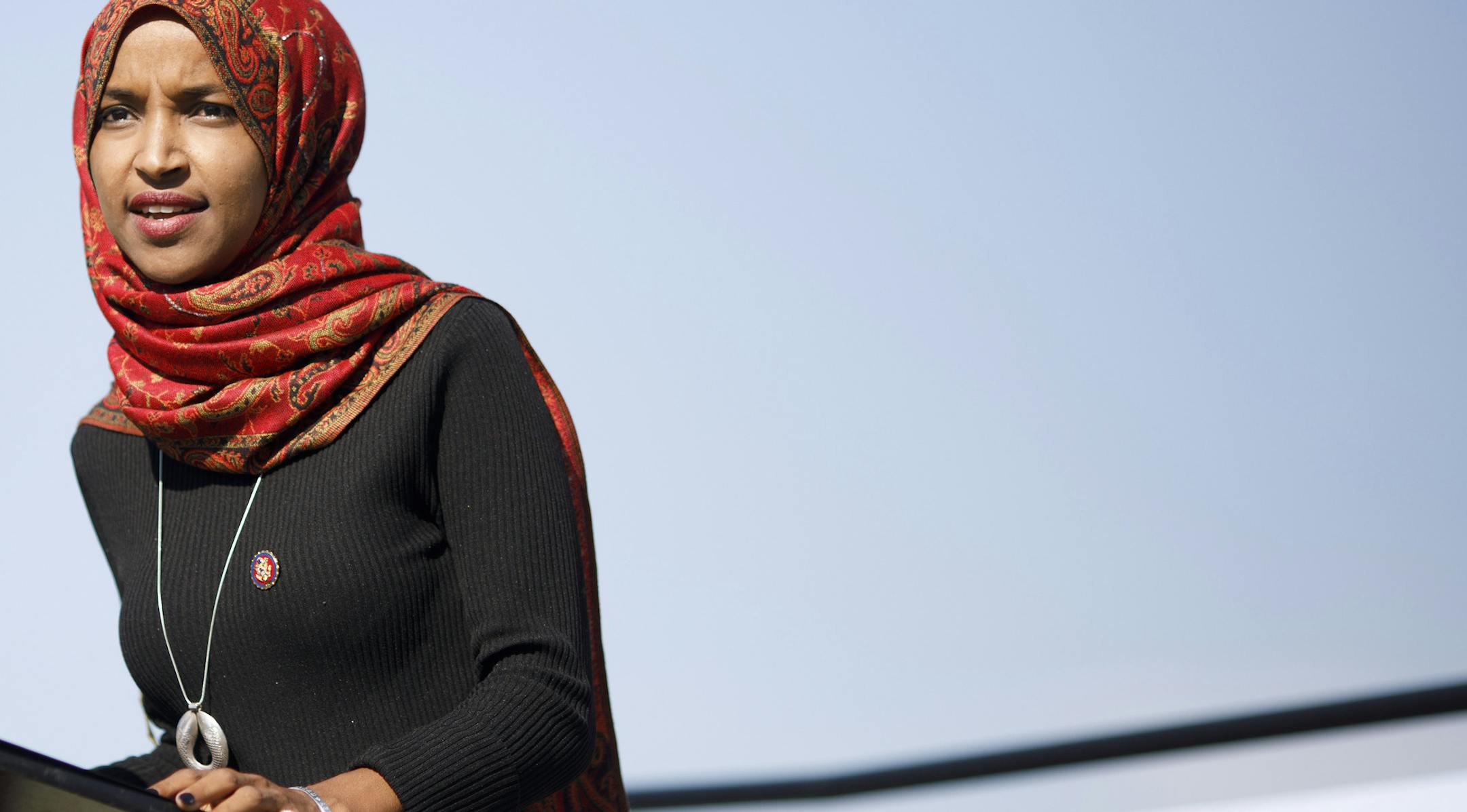 Rep. Ilhan Omar (D-Minn.) speaks at an event marking the one year anniversary of the Supreme Court upholding the Trump administration's travel ban on people from certain Muslim countries, in Washington, June 26, 2019. (Tom Brenner/The New York Times)