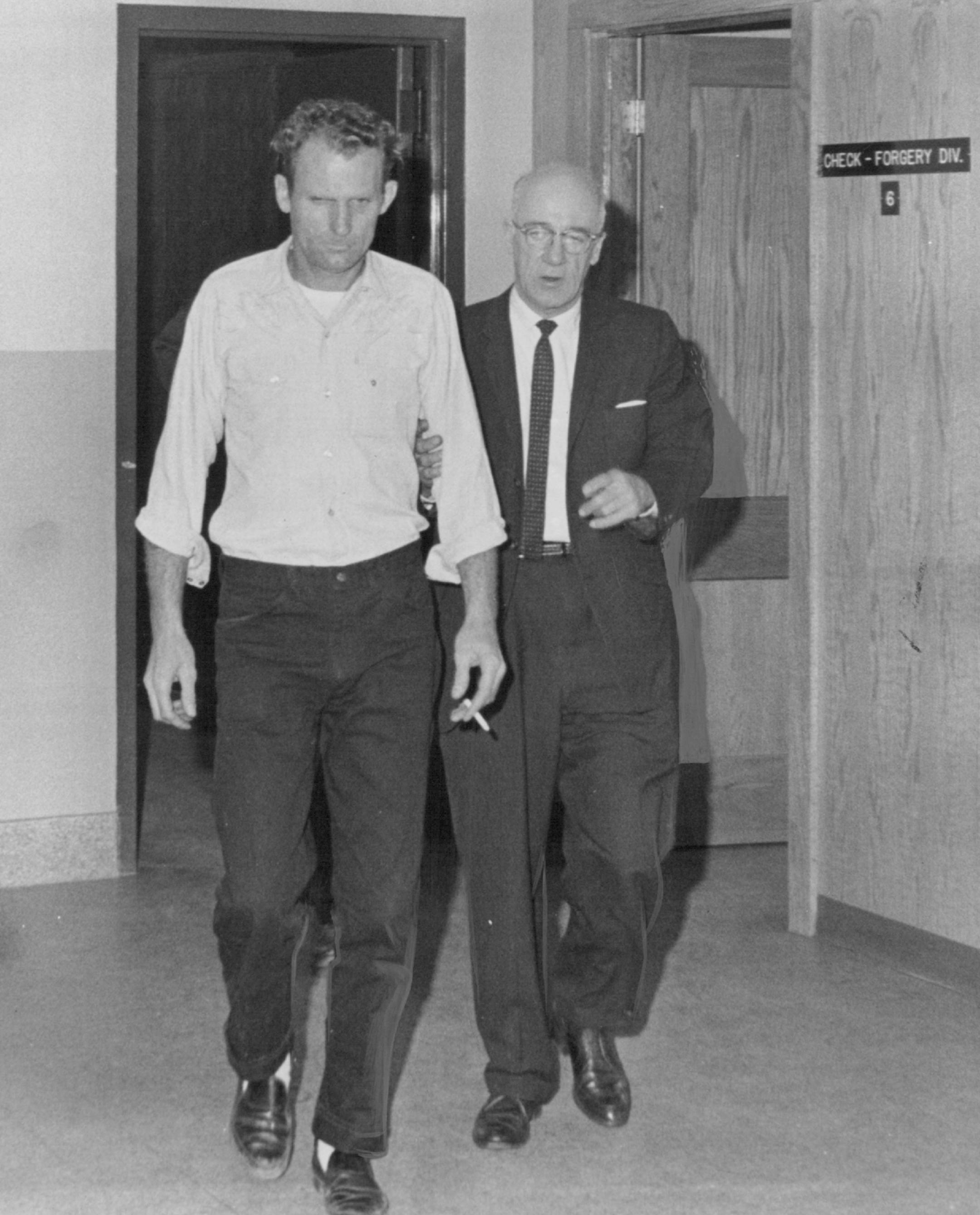 April 23, 1963 Richard Sharp, 36, in custody. St. Paul Detective Lt. George Barkley (right). Dick W. 'C. Anderson told Richard Sharp he mur­dered Mrs. T. Eugene Thompson, Twin Cities police offi­cials reportedly were told Monday in Phoenix, Ariz. This information reportedly is contained in a 23-page statement that Sharp signed after being questioned by police in Phoenix. April 22, 1963 Bob Schranck, Minneapolis Star Tribune