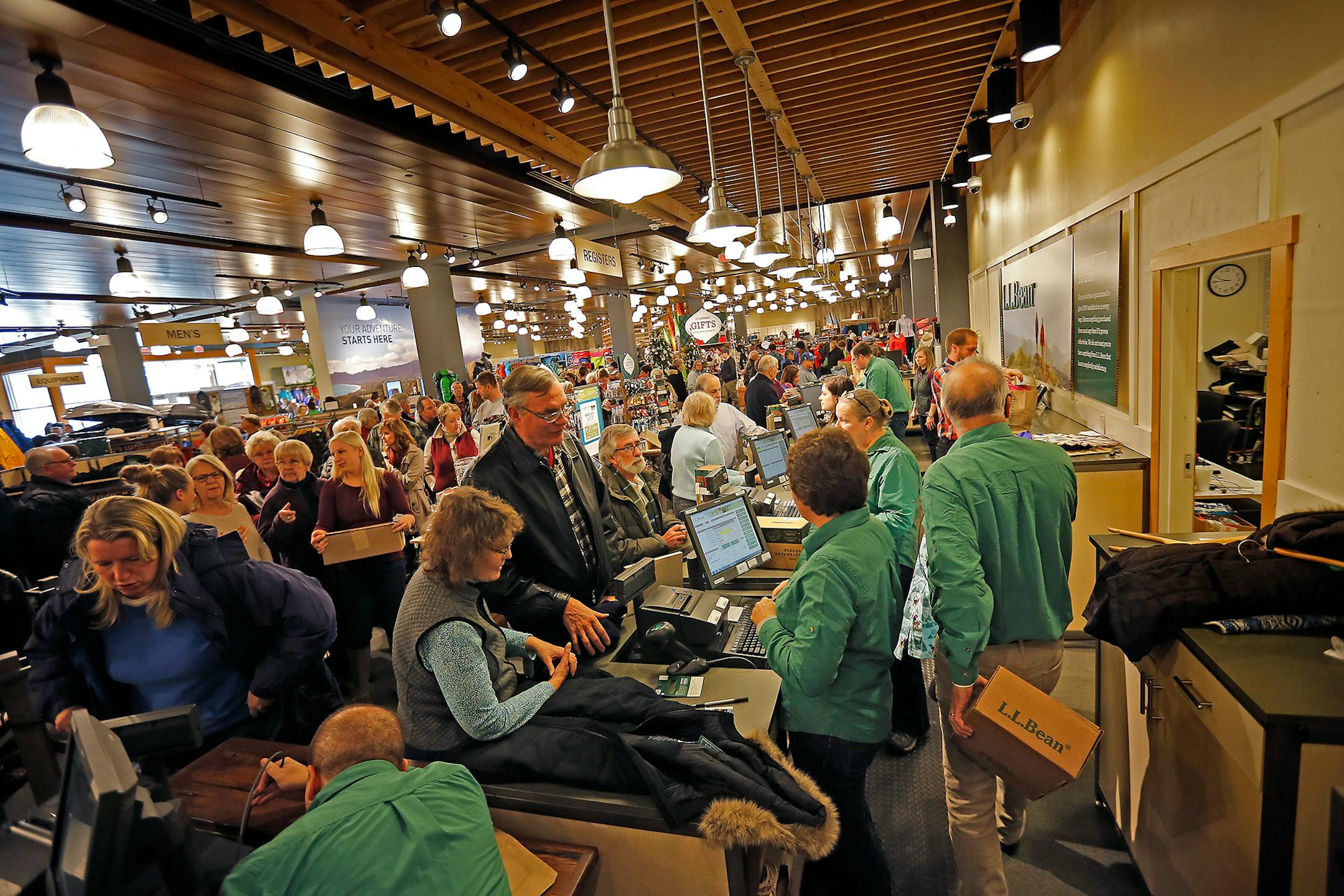 L.L. Bean employees waited on the hundreds of people who shopped at the newly opened L.L. Bean store at the Mall of America, Friday, November 14, 2014 in Bloomington, MN.