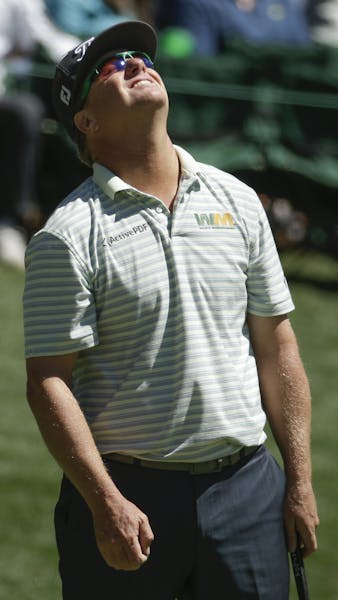Charley Hoffman reacts after missing a birdie putt on the 16th hole during the second round of the Masters golf tournament Friday, April 7, 2017, in A
