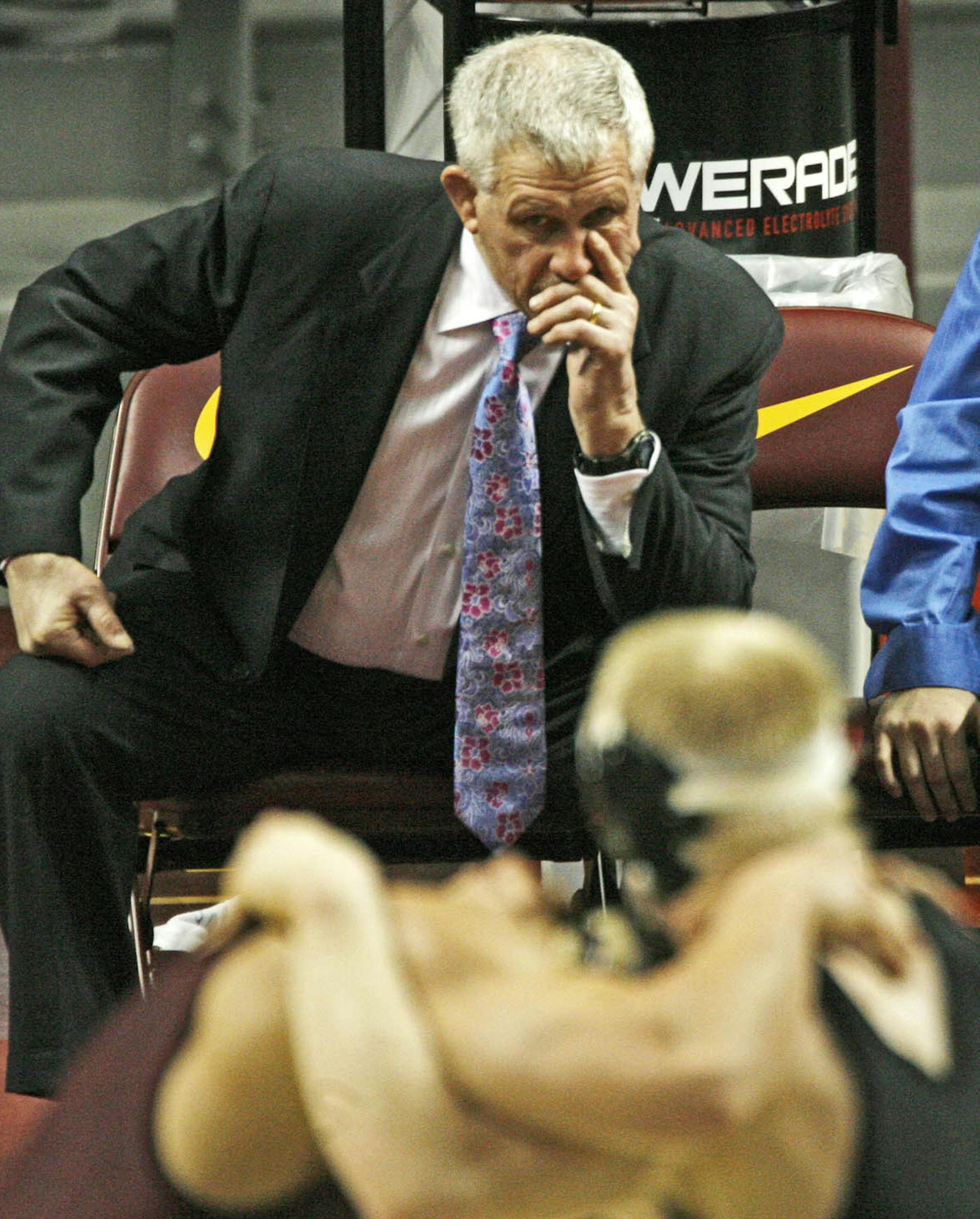 MARLIN LEVISON * mlevison@startribune.com Assign. #20011360A- February 14, 2010 - GENERAL INFORMATION: Minnesota Gophers vs. Iowa wrestling. Iowa won the meet 28 -9. IN THIS PHOTO: ] It was a long night for Gophers head wrestling coach J Robinson as his team lost to Iowa 28 - 9. ORG XMIT: MIN2016052618224739