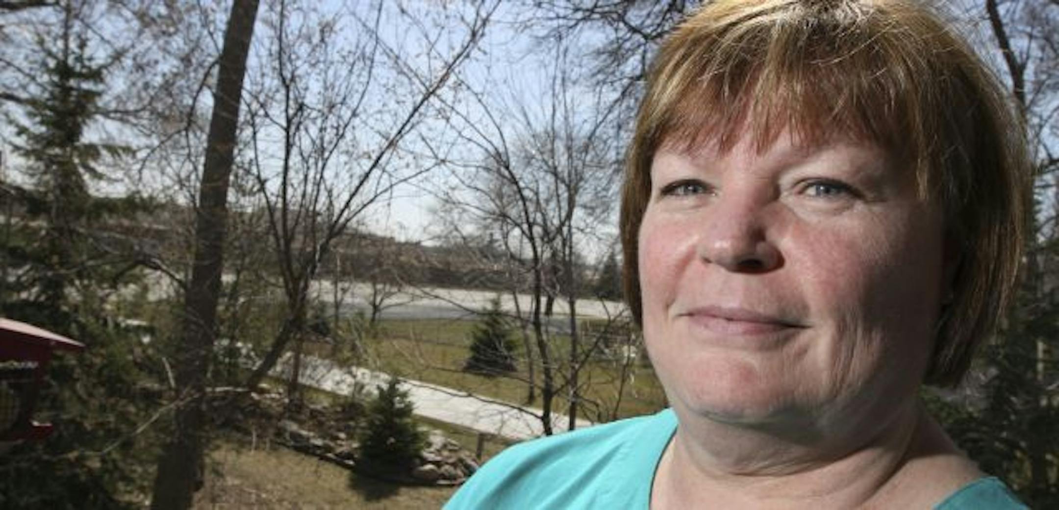 Helen Bertholf and her husband, Dick, live in a townhouse across from the Bell Lumber & Pole Co. yard in New Brighton. The odor is so strong, she said, that they can't be outside or leave the windows open.