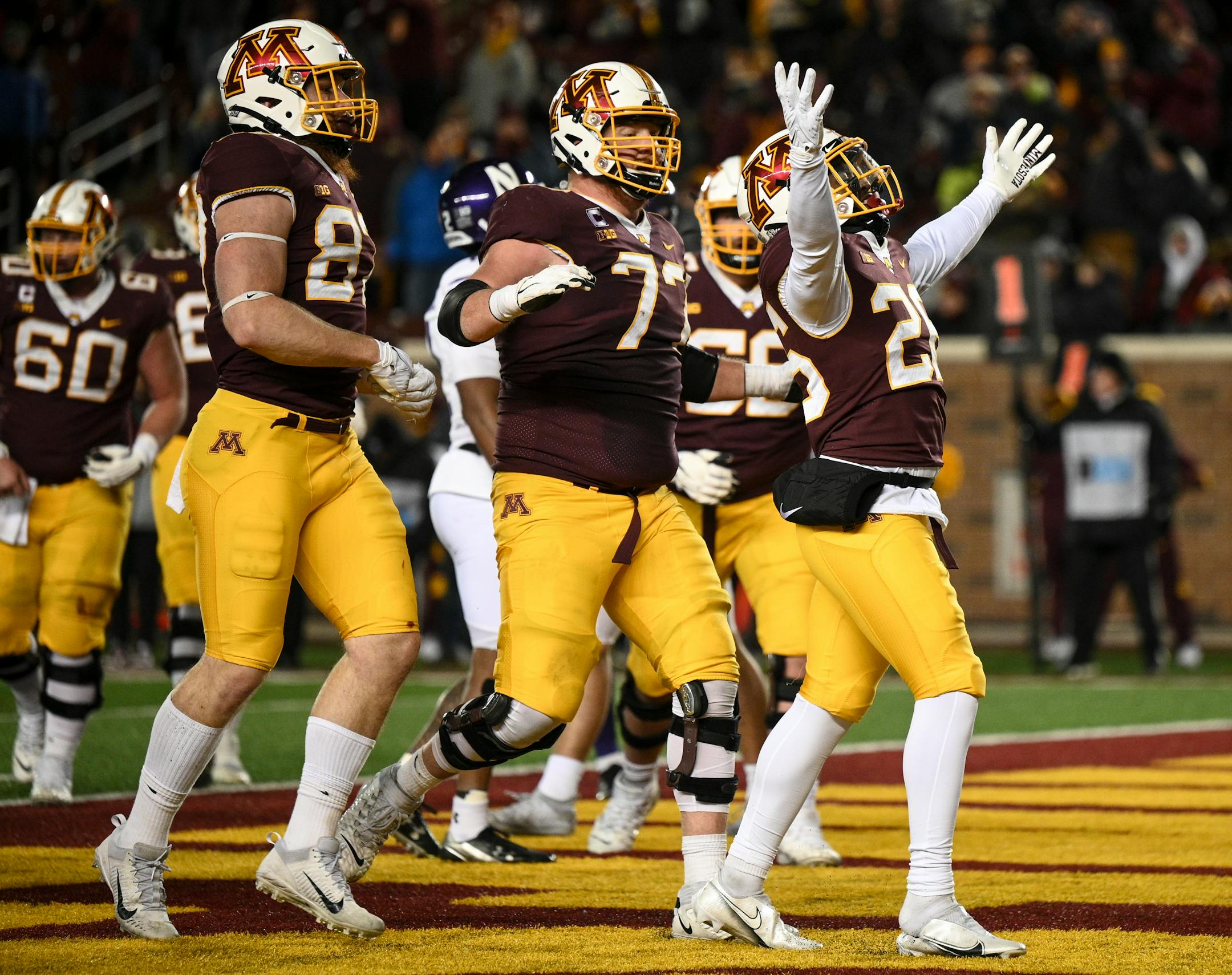 Minnesota Gophers running back Zach Evans (26) celebrates after running the ball for a touchdown against the Northwestern Wildcats during the second half.