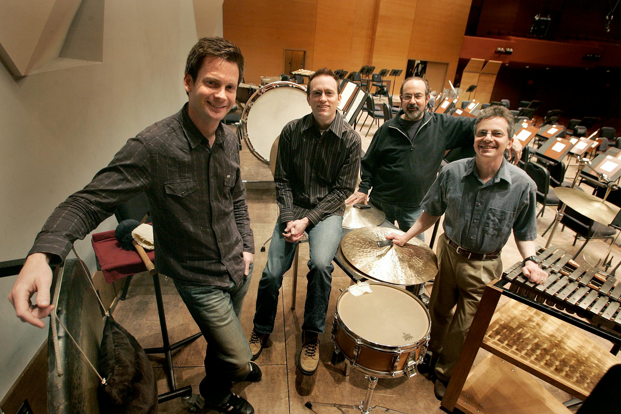 Four percussionists from the Minnesota Orchestra, from left, Kevin Watkins, Brian Mount, Peter Kogan, and Jason Arkis.