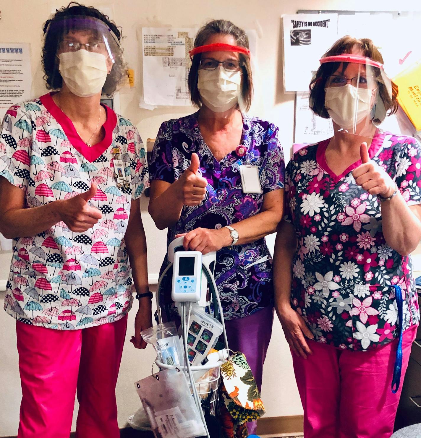 Health care workers at St. Luke's Lutheran Care Center in Blue Earth, Minn., model the masks and visors manufactured by the KnightKrawler robotics team from Irondale High School in Mounds View. ORG XMIT: 59mcadmLNpYGMWGEHDL0