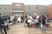 About 100 students and community members gathered outside the Hinckley-Finlayson High School Wednesday afternoon to sing and drum in protest of a scho