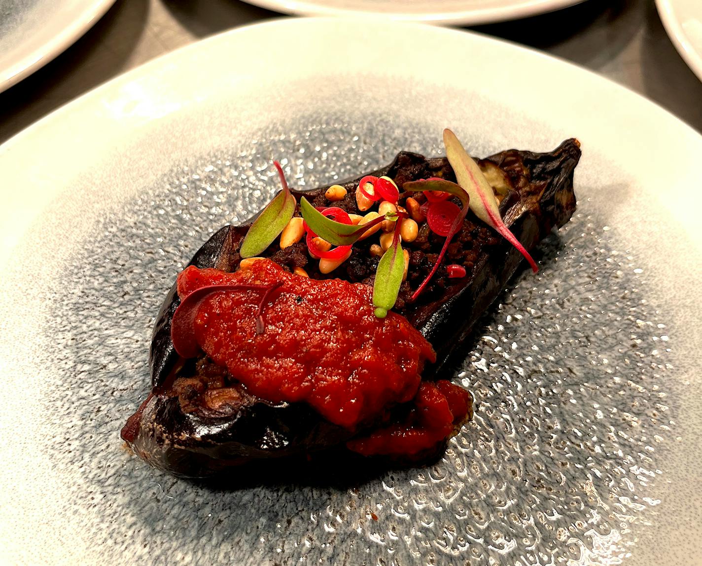 Among the dishes served at the Tullibee Eid dinner: eggplant stuffed with beef and pine nuts.