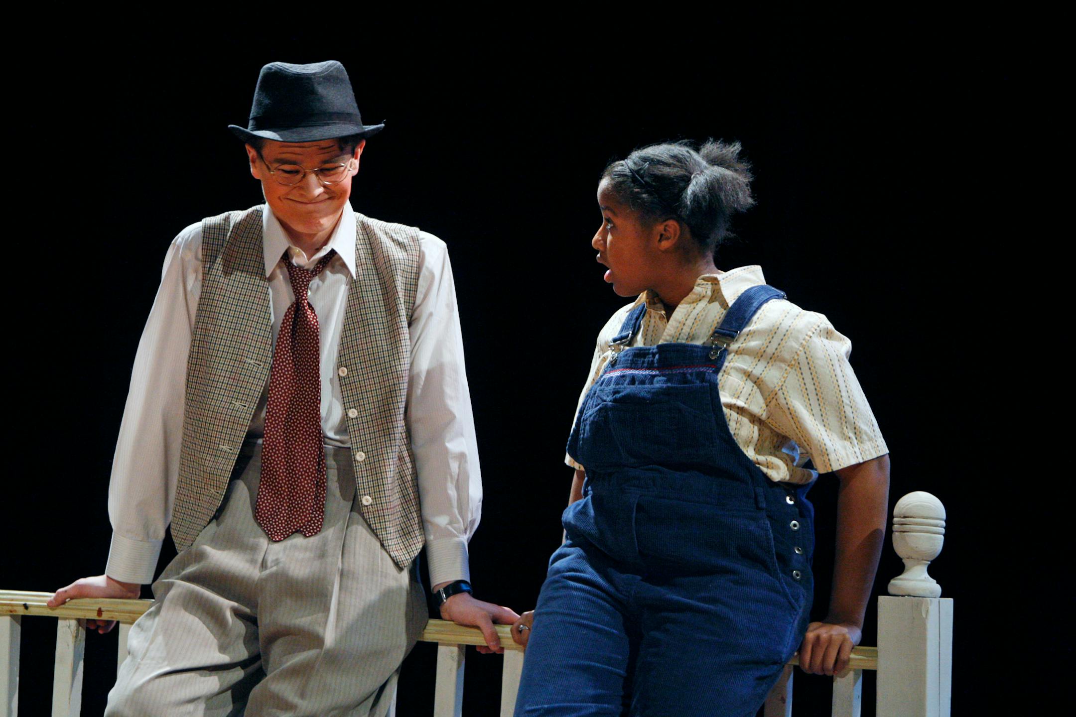 At a dress rehearsal for "To Kill a Mockingbird" at Hopkins High School, Atticus Finch, played by Ross Destiche, spoke with his daughter, Scout, played by Melia Readus. Along with avoiding the harsh language of the racially charged story set in 1930s America, casting for roles ignored racial criteria.