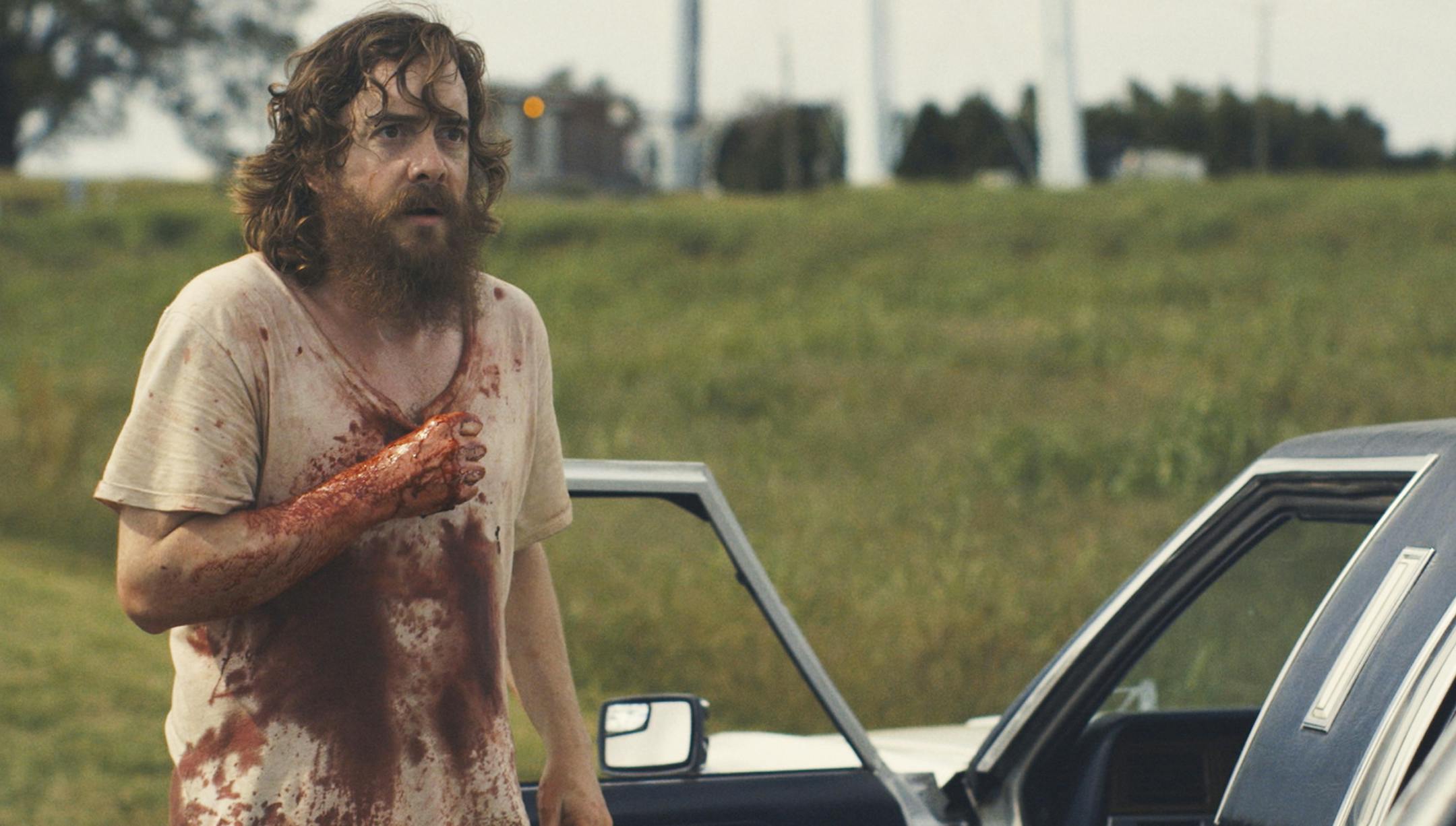 In an undated handout photo, Macon Blair in ‚ÄúBlue Ruin,‚Äù written and directed by Jeremy Saulnier, his friend since childhood. The final cut of the film reflects the moviemaking pair‚Äôs childhood love of blood splatter, makeup effects and extreme, shocking violence, but the dark, pained tone is also filtered through their adult awareness that violence can have horrible consequences. (Radius TWC via The New York Times) -- NO SALES; FOR EDITOR