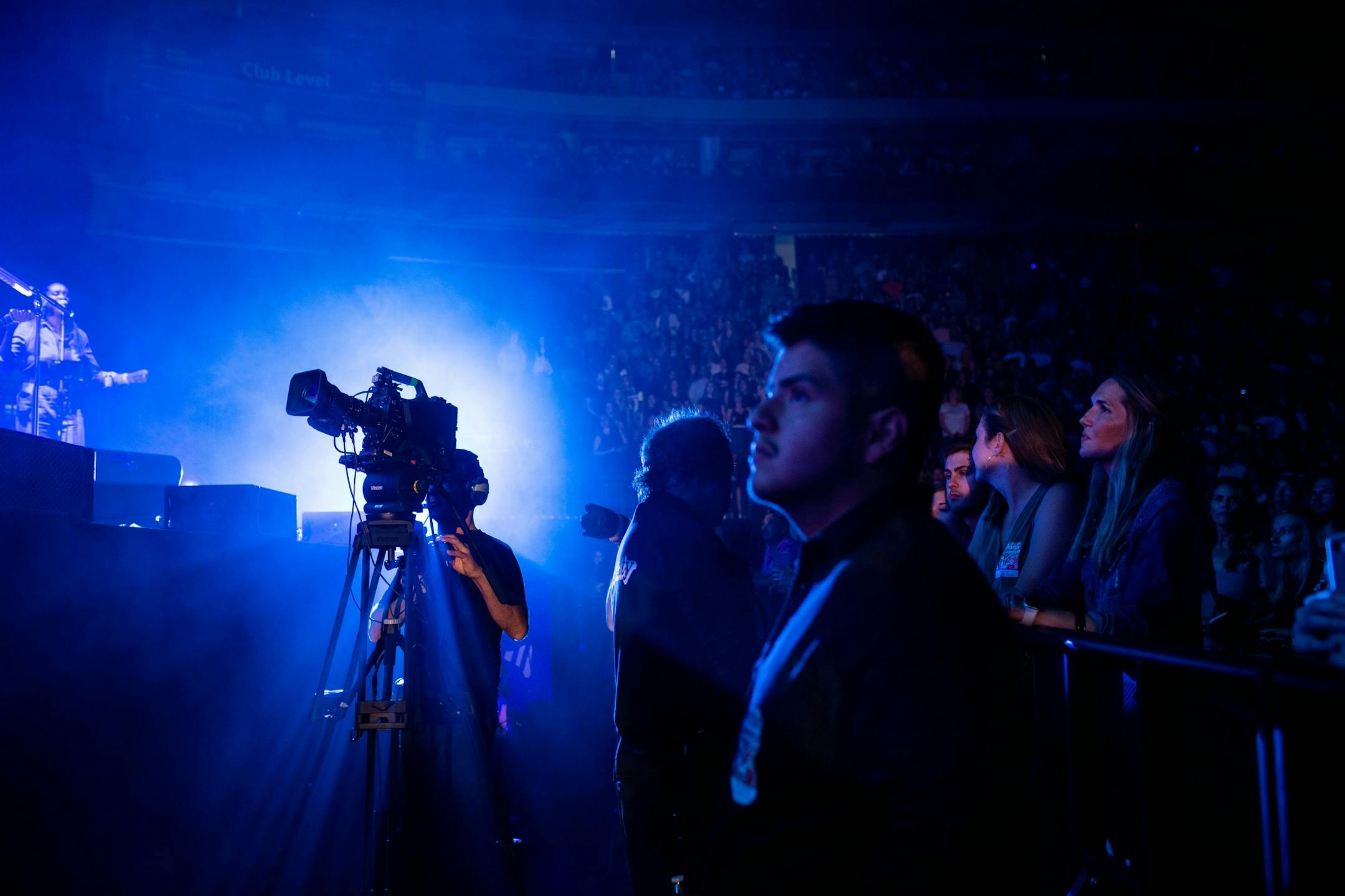 Cameramen film John Mayer as he performs at Xcel Energy Center Monday, August 5, 2019.