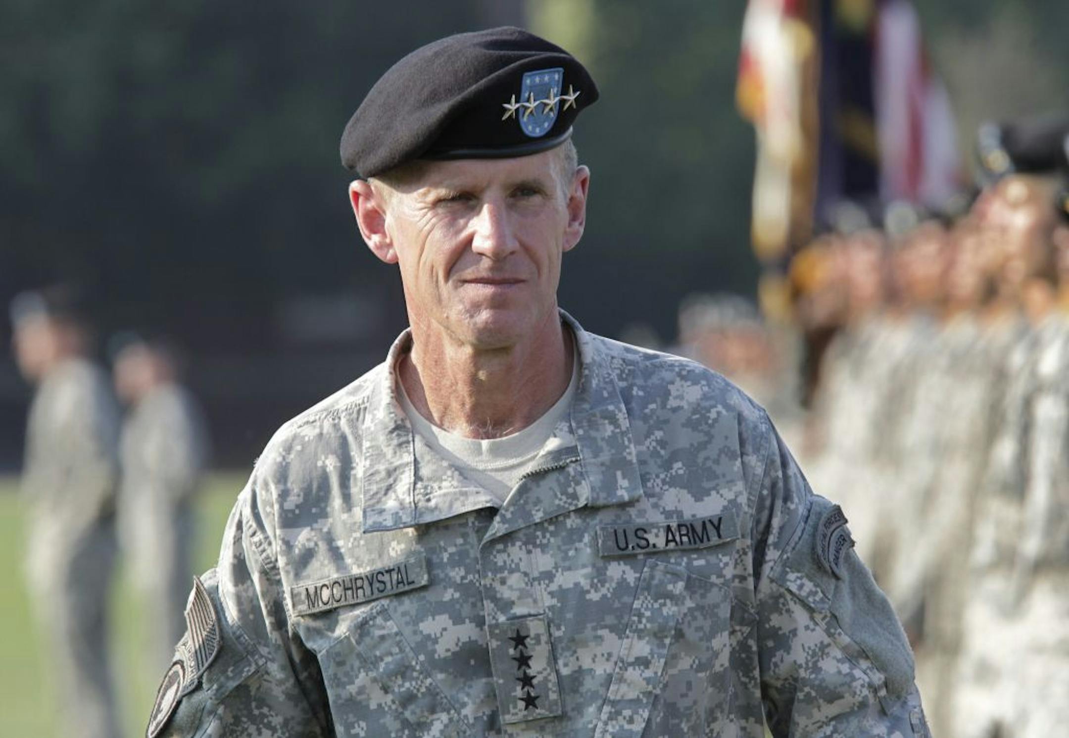 FILE - This July 23, 2010, file photo shows Gen. Stanley McChrystal reviewing troops for the last time as he is honored at a retirement ceremony at Fort McNair in Washington. Speaking out for the first time since he resigned, retired Gen. Stanley McChrystal writes in a new memoir that he takes the blame for the Rolling Stone article that ended his Afghan command and army career, including for the unflattering comments attributed to his staff about the Obama administration.