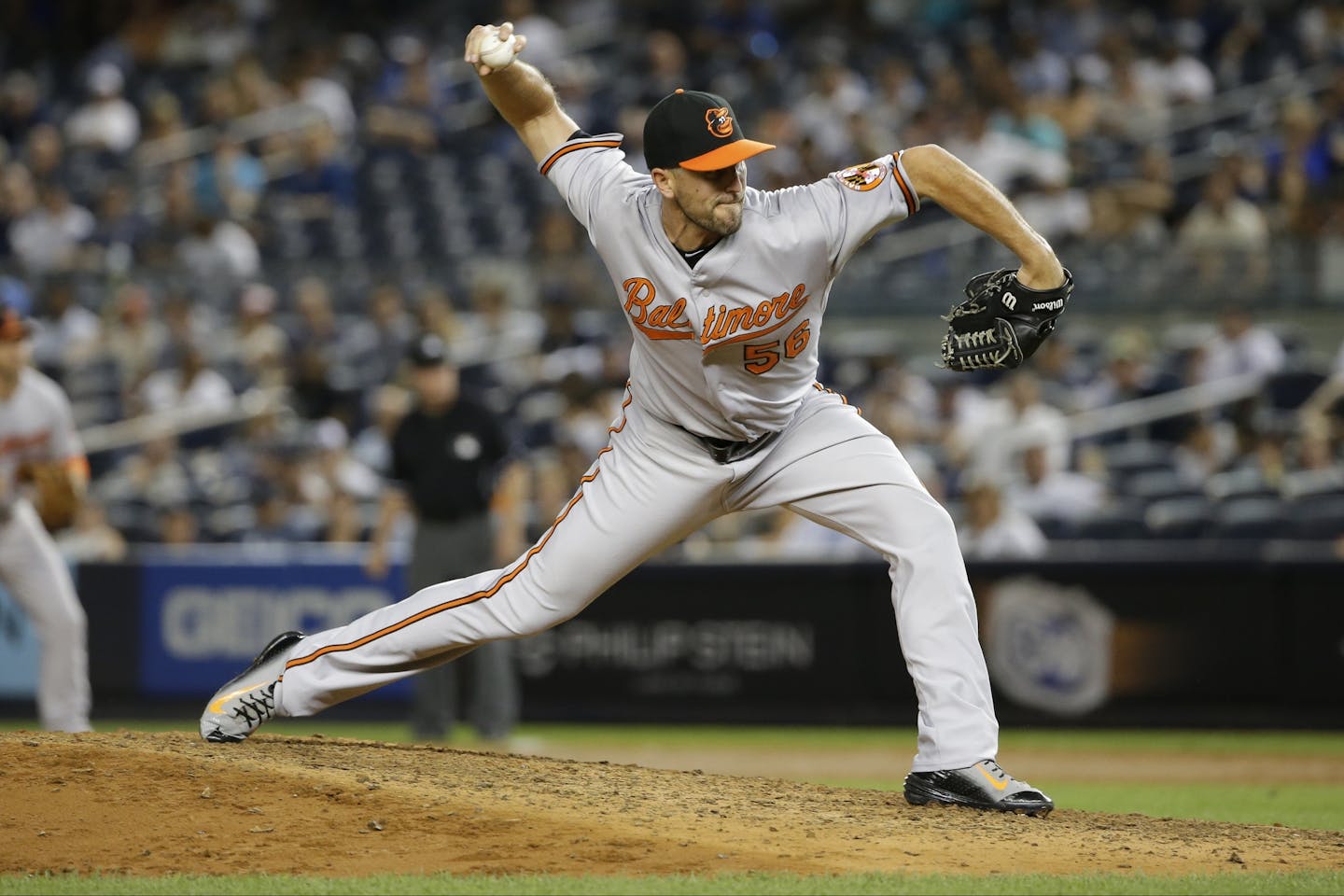 Baltimore Orioles' Darren O'Day delivers a pitch during the eighth inning of a baseball game Wednesday, Sept. 9, 2015, in New York. (AP Photo/Frank Franklin II) ORG XMIT: NYFF1