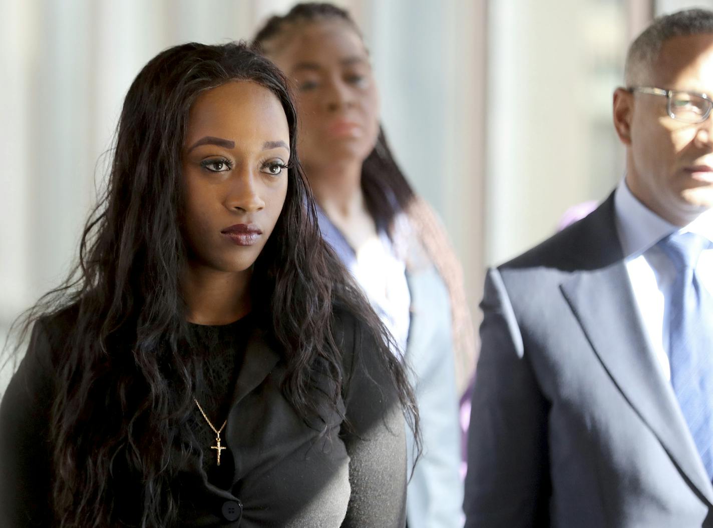 Diamond Reynolds, the girlfriend of Philando Castile, who live streamed his shooting on Facebook, arrives in court to resume her turn on the witness stand during the trial of police officer Jeronimo Yanez, Tuesday, June 6, 2017, at the Ramsey County Courthouse in St. Paul, Minn. Yanez is charged in the July 6 death of Castile, a 32-year-old elementary school cafeteria worker, in a St. Paul suburb. (David Joles/Star Tribune via AP)