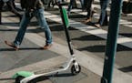 FILE -- A scooter on the sidewalk in downtown San Francisco, April 16, 2018. Doctors and public health workers in San Francisco are preparing to track