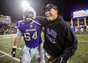 FILE - In this Dec. 9, 2016 file photo, James Madison head coach Mike Houston, right, celebrates with offensive lineman Matt Frank after a game agains