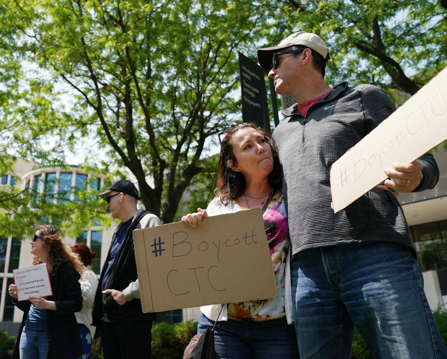 Jina Penn-Tracy, who said she was abused at Children's Theatre in the 1980s, joined a protest outside the theater Saturday.