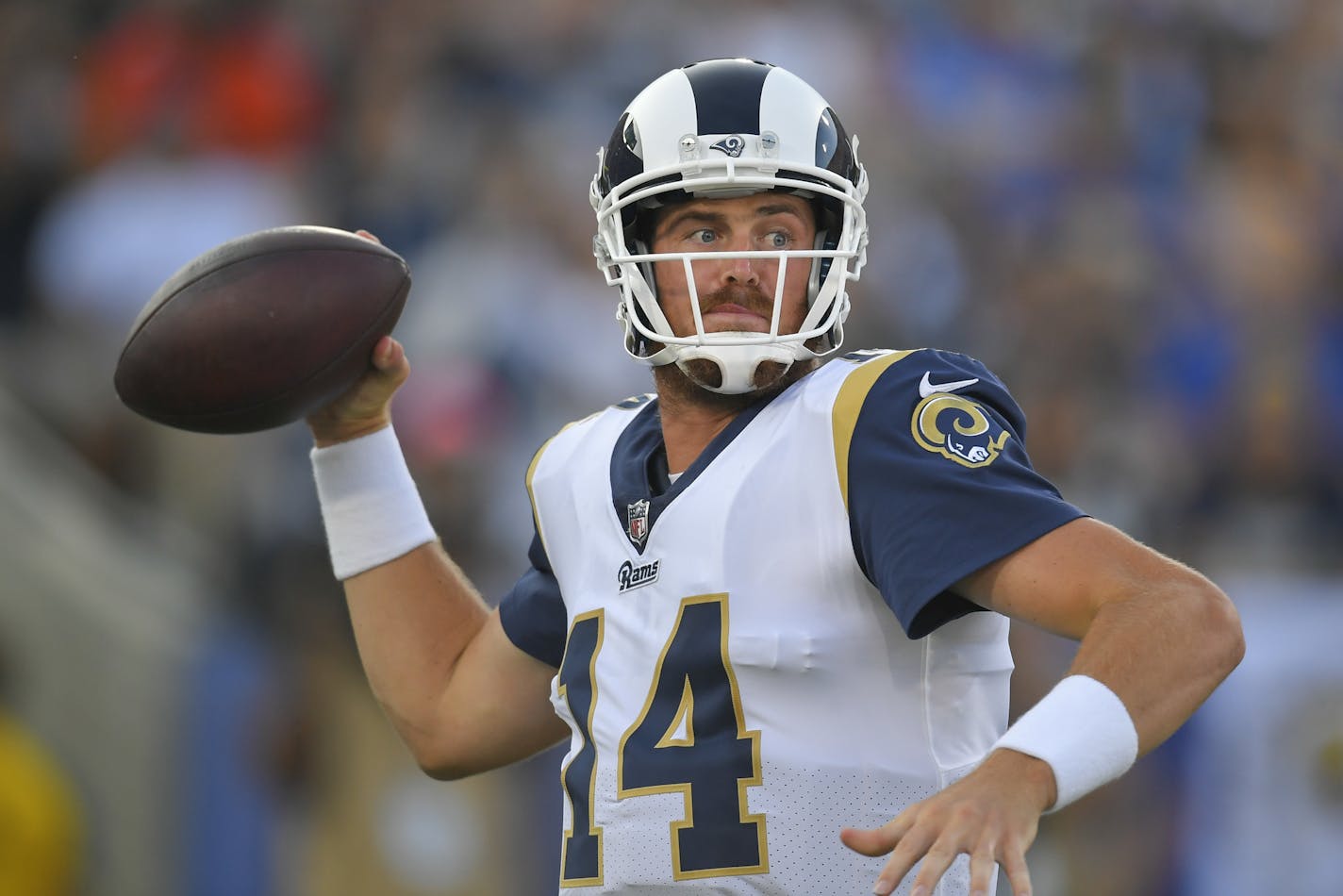 Los Angeles Rams quarterback Sean Mannion looks to throw a pass during the first half of a preseason NFL football game against the Dallas Cowboys Saturday, Aug. 12, 2017, in Los Angeles. (AP Photo/Mark J. Terrill)