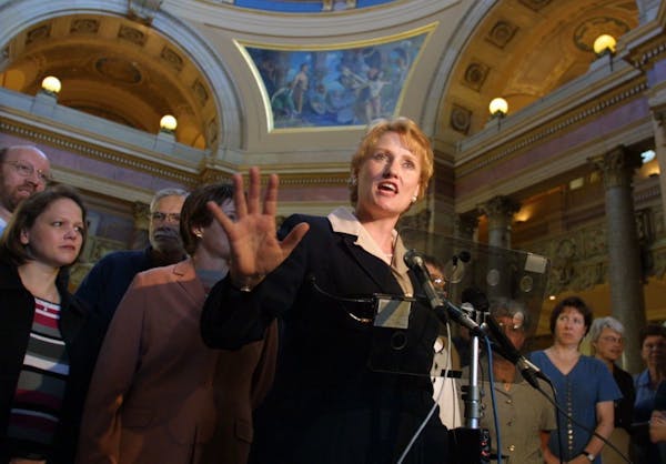 St. Paul, MN thursday 6/28/2001 House member Rep. Betty Folliard appeared before cameras and microphones outside the house chamber to accuse some memb