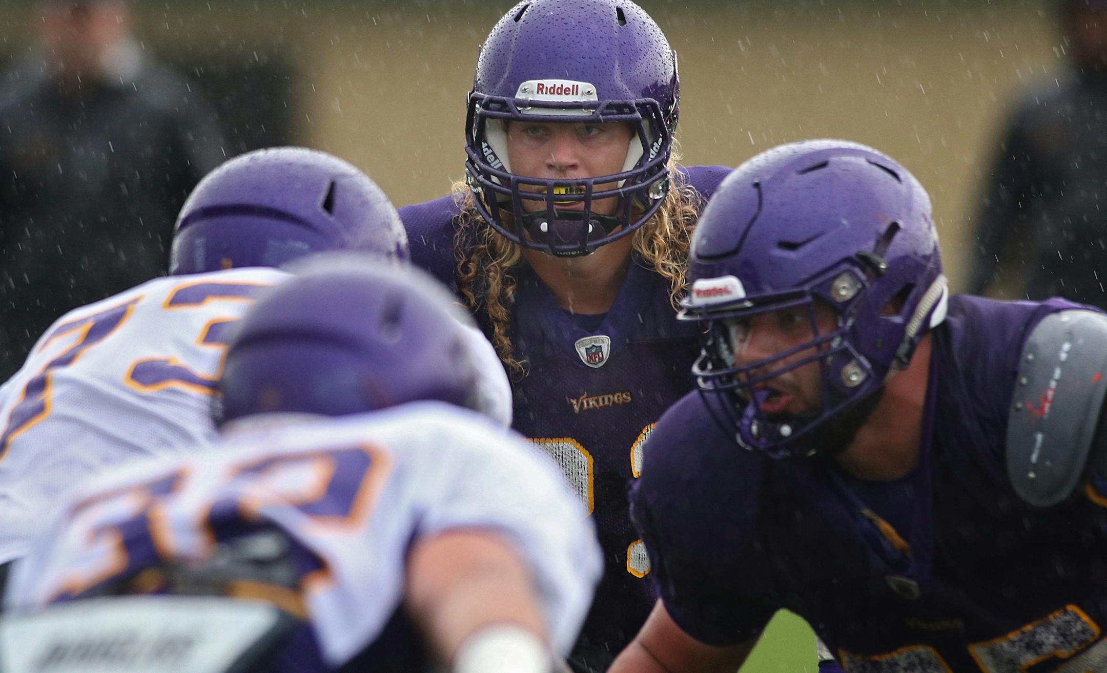 Minnesota State University, linebacker Tyler Henderson (middle) practiced with the team. ] JIM GEHRZ &#xef; james.gehrz@startribune.com / Mankato, MN / August 27, 2015 / 3:45 PM &#xf1; BACKGROUND INFORMATION : Minnesota State University, Mankato football practice. We want to shoot MSU practice of coach Todd Hoffner, running back Connor Thomas (5), QB Ricky Lloyd (8), DE Josh Gordon (95) and LB Tyler Henderson (33). At Blkakslee Stadium.