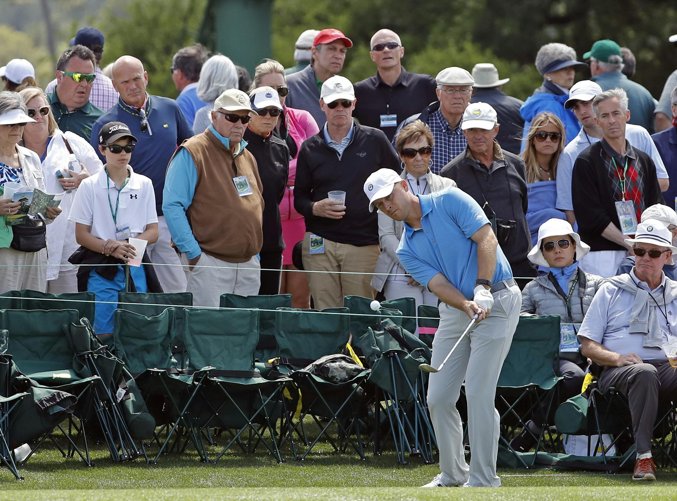 Amateur Sammy Schmitz hits to the ninth green during the first round of the Masters golf tournament Thursday, April 7, 2016, in Augusta, Ga. (AP Photo/Matt Slocum)