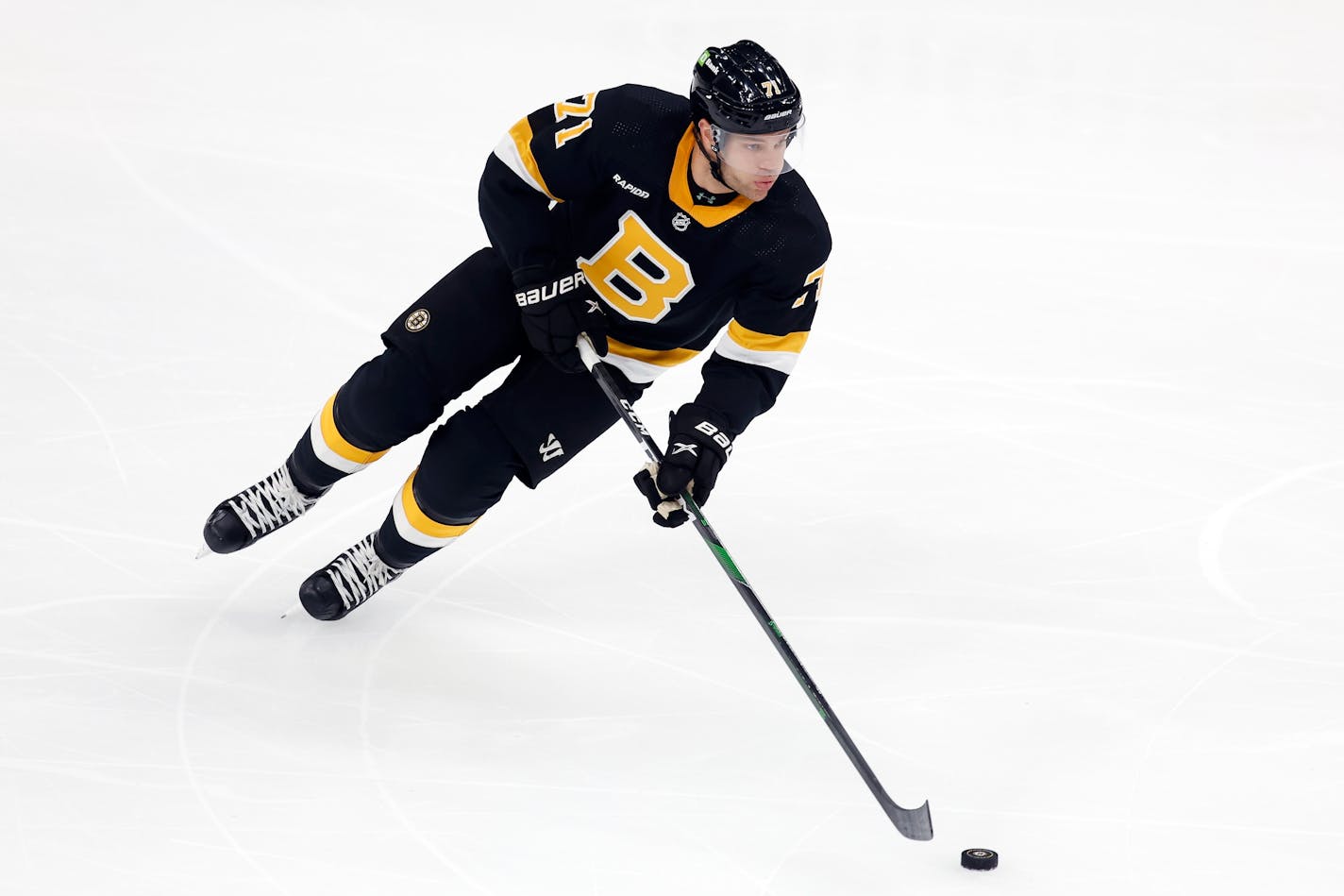 Boston Bruins' Taylor Hall plays against the Minnesota Wild during the first period of an NHL hockey game, Saturday, Oct. 22, 2022, in Boston. (AP Photo/Michael Dwyer)