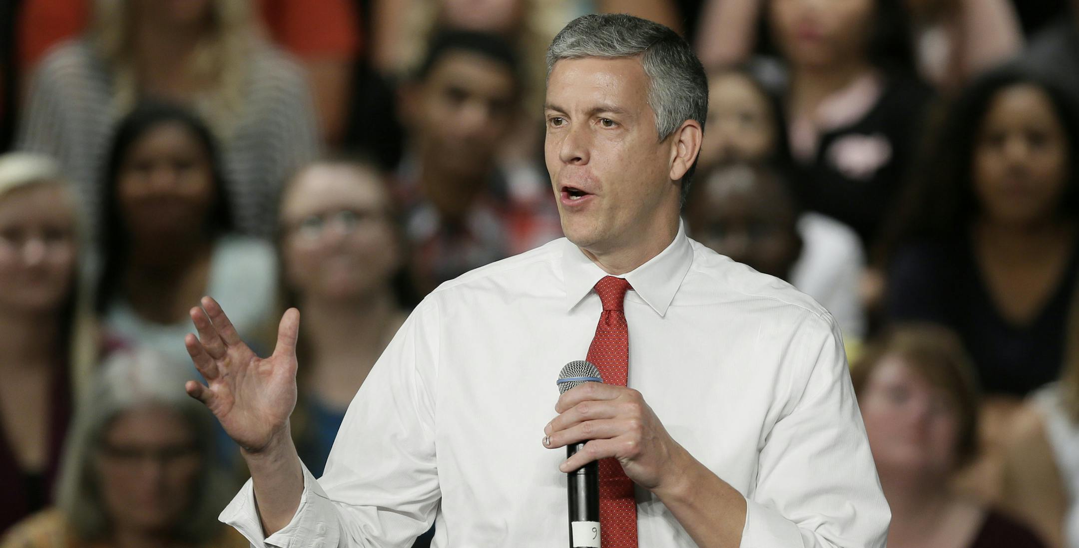 FILE - In this Sept. 14, 2015 file photo, Education Secretary Arne Duncan speaks during a town hall meeting in Des Moines, Iowa. Duncan is stepping down in December after 7 years in the Obama administration. Duncan says in a letter to staff that he&#xed;s returning to Chicago to live with his family. (AP Photo/Charlie Neibergall, File)