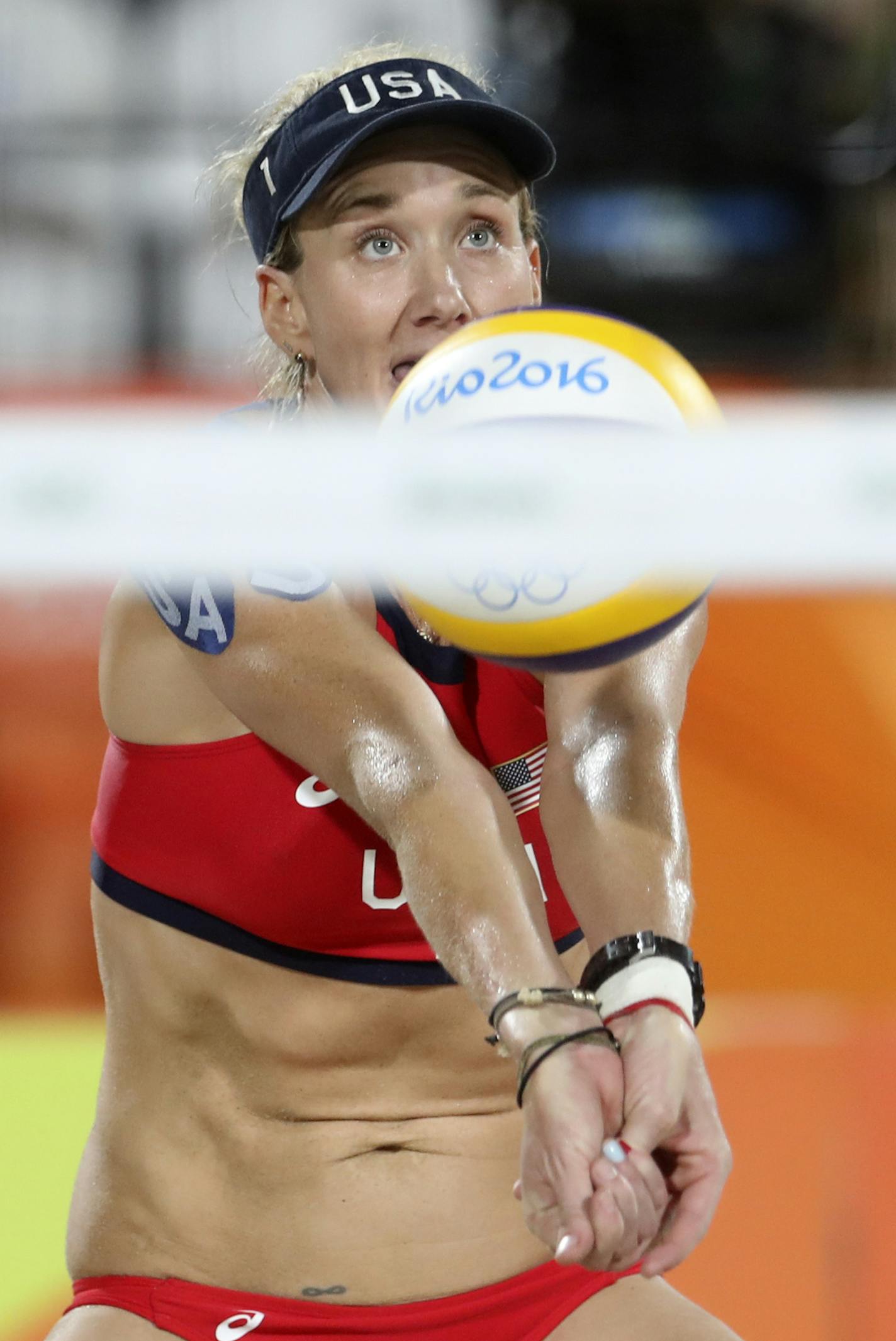 United States' Kerri Walsh Jennings passes a ball while playing against Brazil during the women's beach volleyball bronze medal match of the 2016 Summer Olympics in Rio de Janeiro, Brazil, Wednesday, Aug. 17, 2016. (AP Photo/Petr David Josek)