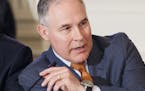 FILE &#xf3; Scott Pruitt, head of the Environmental Protection Agency, speaks at a meeting in the White House in Washington, Feb. 12, 2018. The Enviro