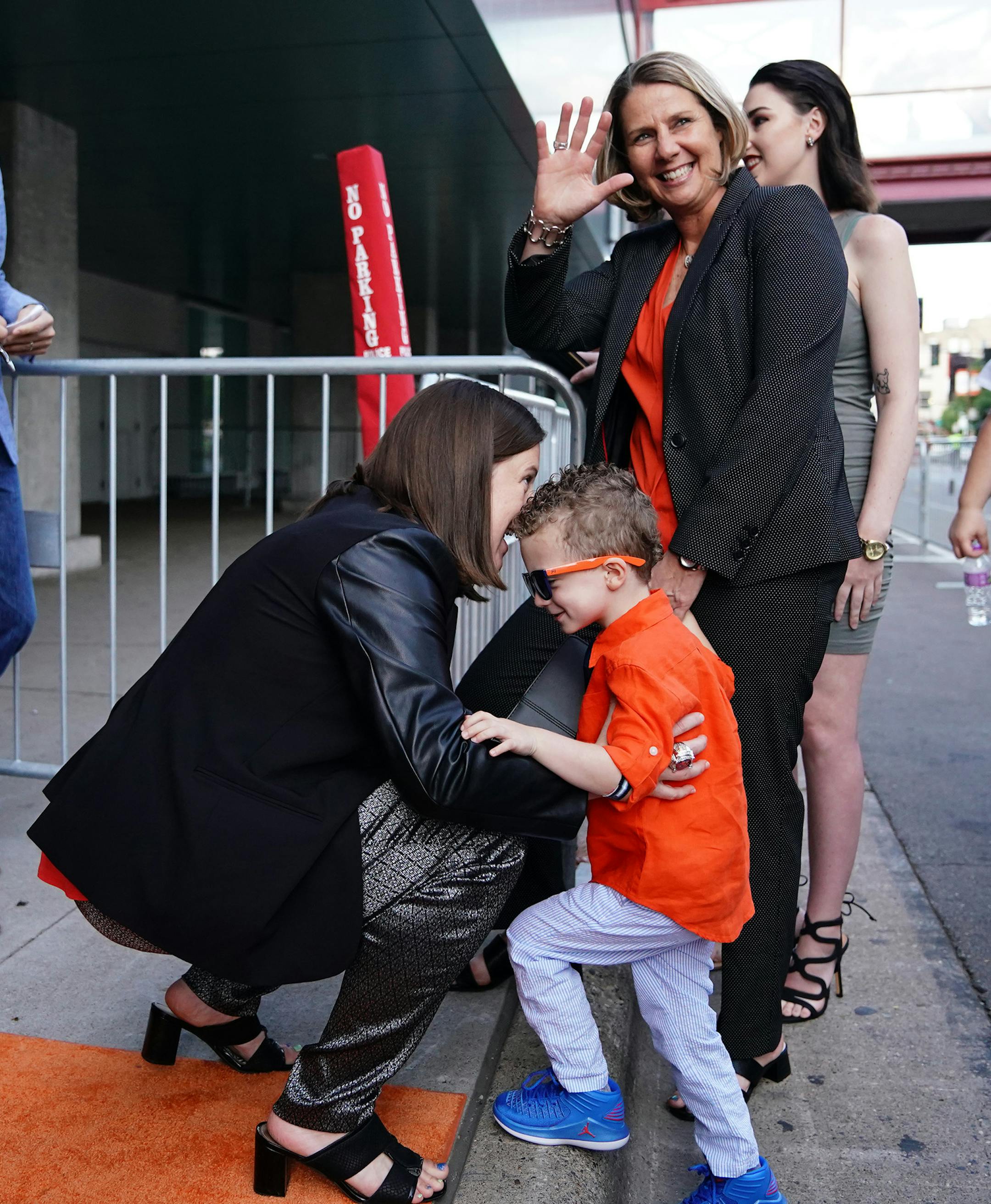 Minnesota Lynx head coach Cheryl Reeve laughed as she held hands with her son Oliver while her wife Carley Knox gave him a hug as they arrived on the orange carpet. ] ANTHONY SOUFFLE ï anthony.souffle@startribune.com Players arrived on the orange carpet for a private formal reception ahead of the WNBA All Star Game Friday, July 27, 2018 at the Target Center in Minneapolis