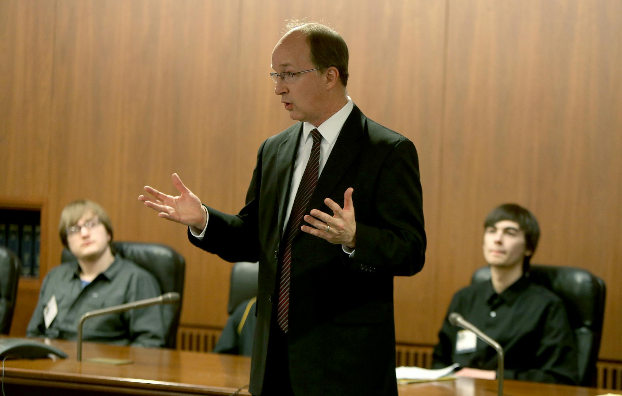 Representative Will Morgan, who is also a Burnsville physics teacher, discussed a bill with Burnsville High School students, Tuesday, March 11, 2014 in the State Office Building in St. Paul, MN. ] (ELIZABETH FLORES/STAR TRIBUNE) ELIZABETH FLORES • eflores@startribune.com