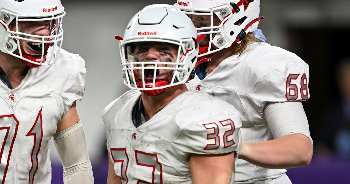 Simley linebacker Gavin Nelson (32) celebrates after he sacked Rocori Quarterback Jack Spanier (7) during the second half of a Class 4A semifinal playoff game Thursday, Nov. 17, 2022 at U.S. Bank Stadium in Minneapolis, Minn.. ] AARON LAVINSKY • aaron.lavinsky@startribune.com