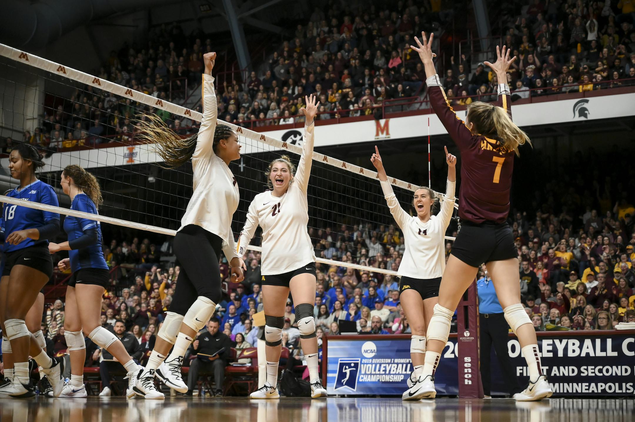 Minnesota players, including, from left, outside hitter Alexis Hart (19), middle blocker Regan Pittman (21), setter Kylie Miller (14) and libero CC McGraw (7) celebrated a point scored by Hart against Creighton late in the first set. ] Aaron Lavinsky • aaron.lavinsky@startribune.com The Minnesota Gophers played the Creighton Bluejays in the second round of the NCAA Volleyball Tournament on Saturday, Dec. 7, 2019 at Maturi Pavilion in Minneapolis, Minn.