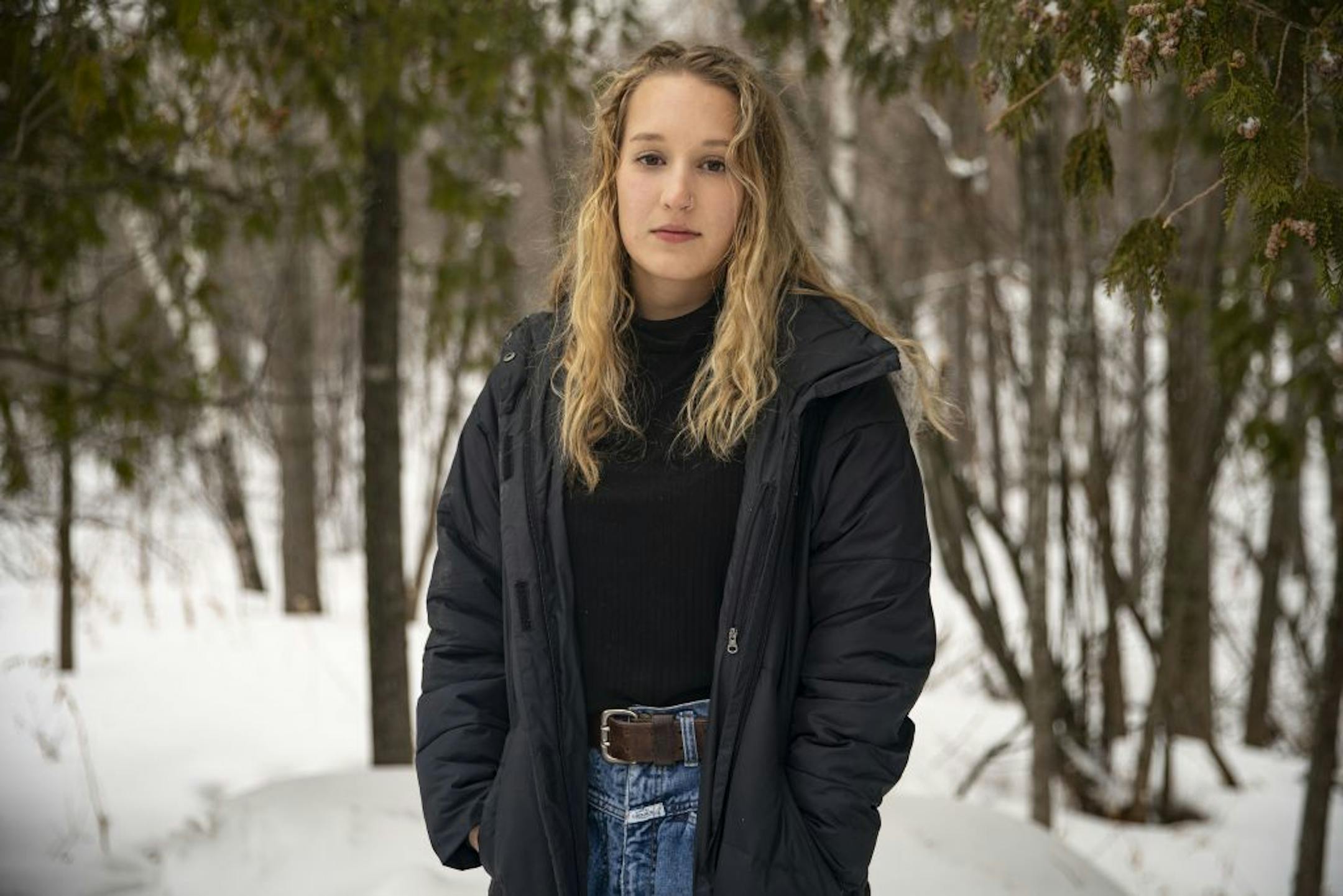 Annie Counihan posed for a portrait in front of a small grove of trees on the University of Minnesota at Duluth campus on Tuesday January 14, 2020.