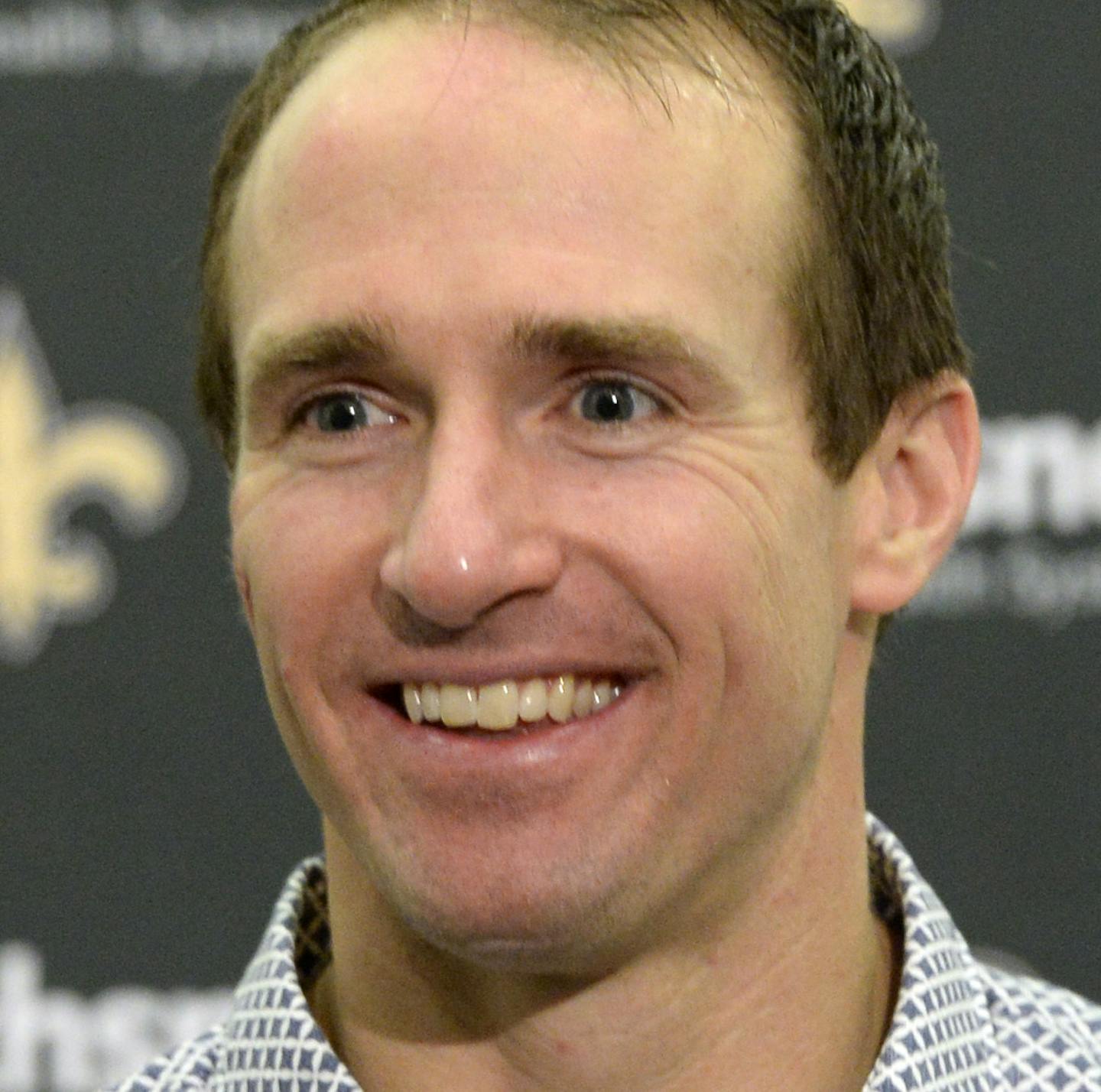 New Orleans Saints quarterback Drew Brees speaks to reporters after an NFL football game in New Orleans, Sunday, Dec. 24, 2017. The Saints won 23-13, clinching a playoff berth. (AP Photo/Bill Feig) ORG XMIT: LAGH1