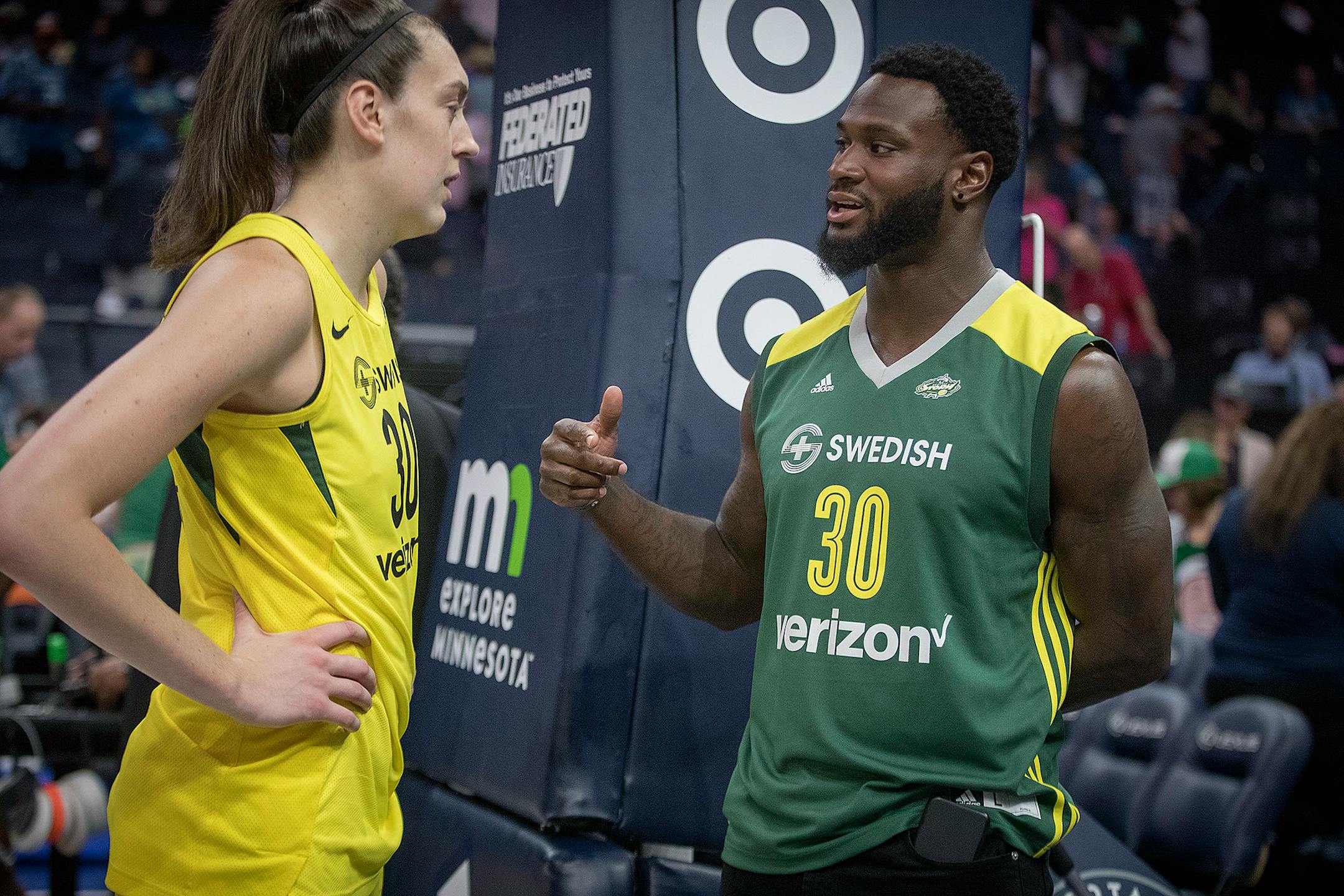 Seattle Storm's forward Breanna Stewart was greeted by Minnesota Viking Latavius Murray after they defeated the Minnesota Lynx 81-72 at the Target Center, Sunday, August 12, 2018 in Minneapolis, MN. ] ELIZABETH FLORES ï liz.flores@startribune.com
