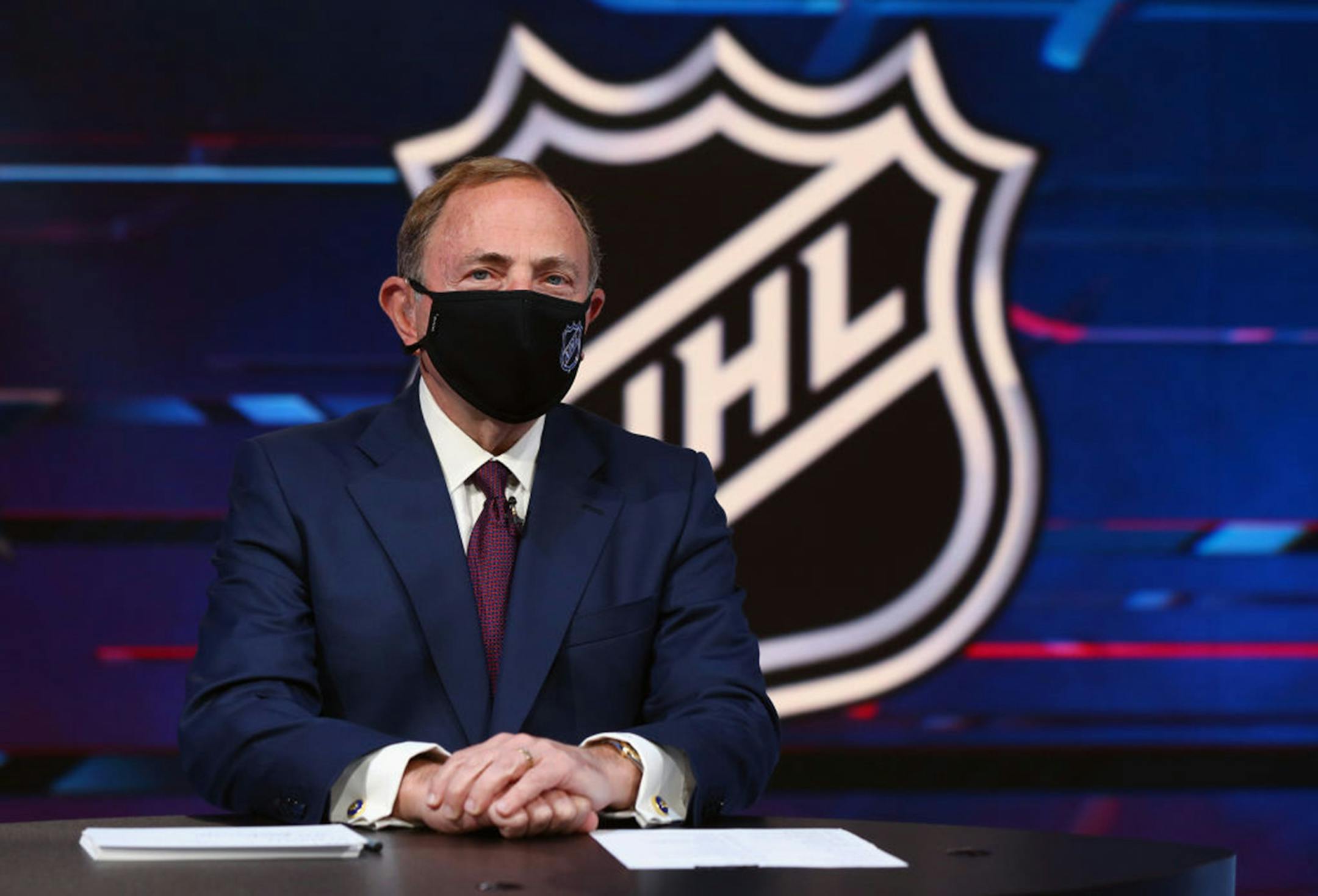 NHL Commissioner Gary Bettman warned players Wednesday they are likely going to have to pay one way or another to make up for the league's projected lost revenue whenever the 2020-21 season gets underway.