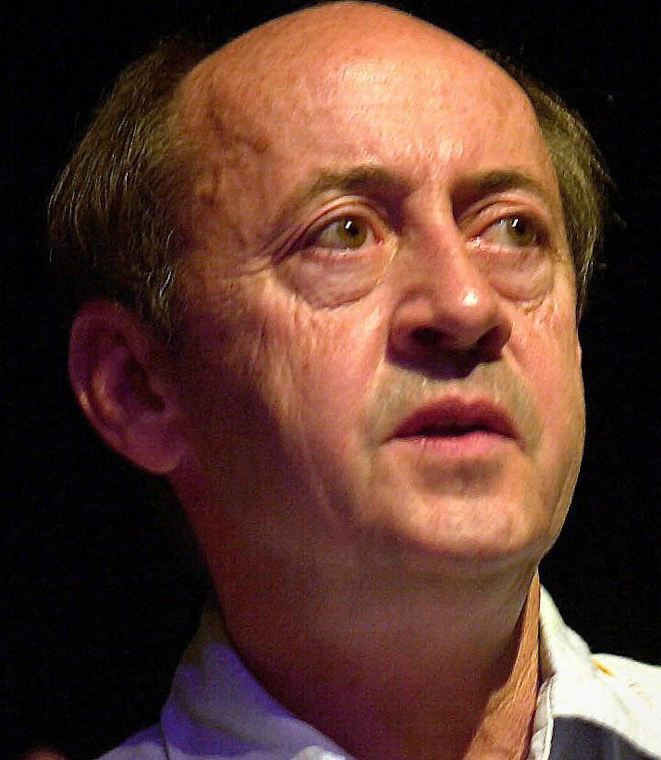 ADVANCE FOR WEEKEND EDITIONS, SEPT. 27-30--Poet Billy Collins reads his work during a poetry fair in Woodstock, N. Y., Aug. 26, 2001. Collins was named America's new poet laureate last June by the Library of Congress. (AP Photo/Gino Domenico)