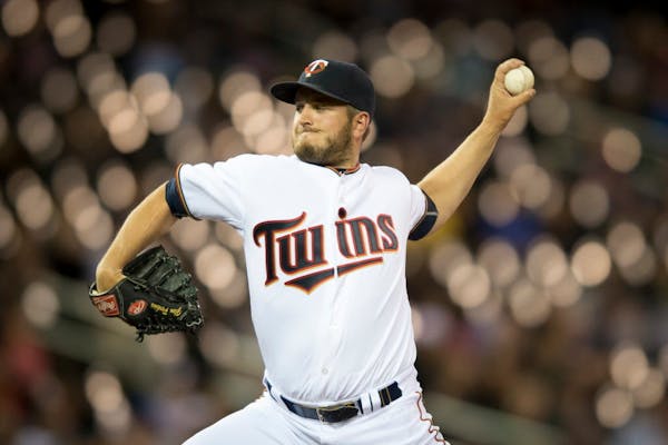 Minnesota Twins relief pitcher Glen Perkins throws a pitch against the Kansas City Royals in the top of the ninth inning. ] (Aaron Lavinsky | StarTrib