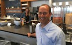 Code42 CEO Joe Payne and employee Katie Vosbeek
in the kitchen area of the expanding Software company's new dowtown headquarters at 100 S. Washington 