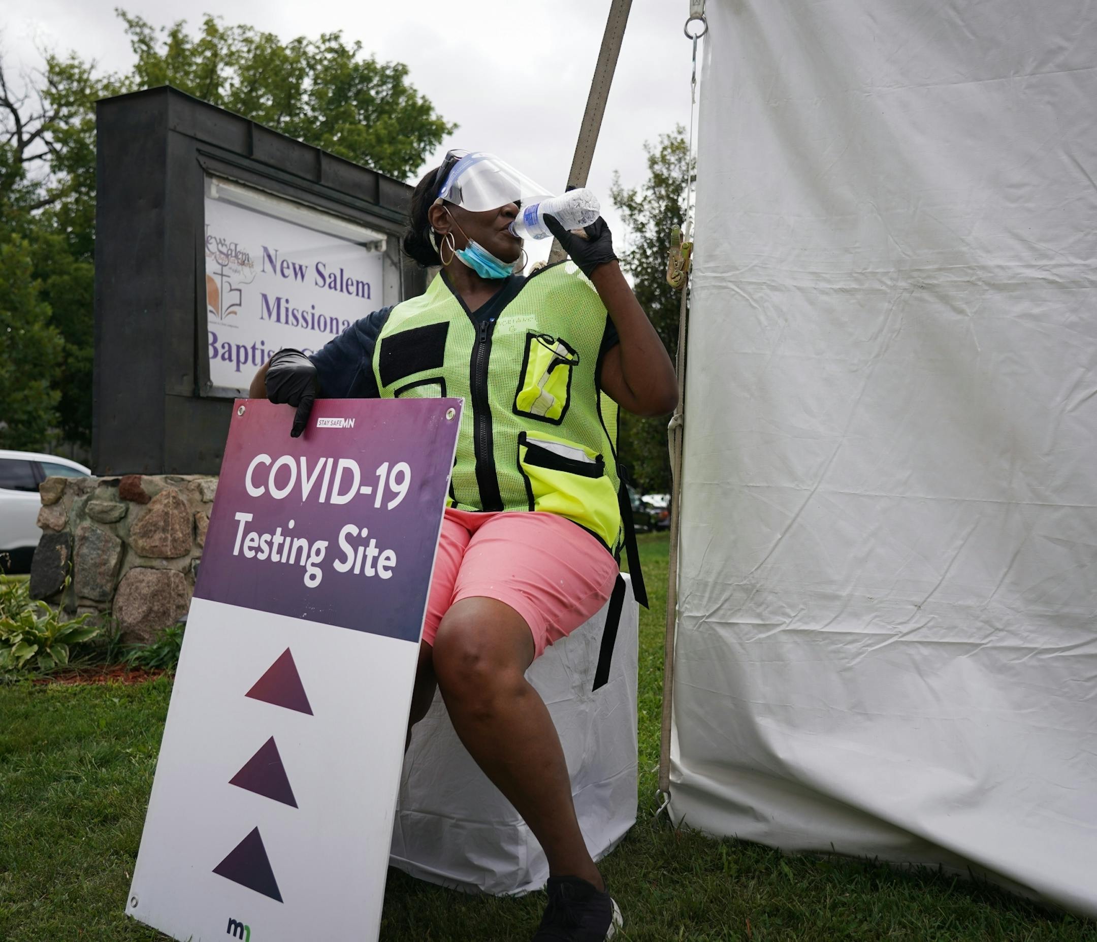 Adriane Green volunteered at the free COVID-19 testing event at New Salem Baptist Church in Minneapolis. Green, who is retired, said she waned to "take a break from watching talk shows and make [herself