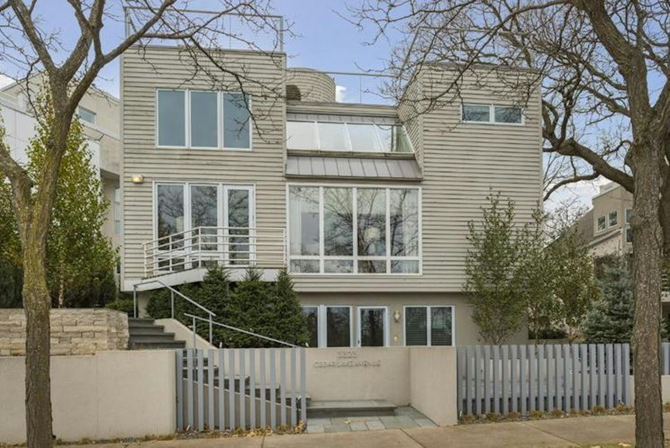 This contemporary-style home overlooks Cedar Lake