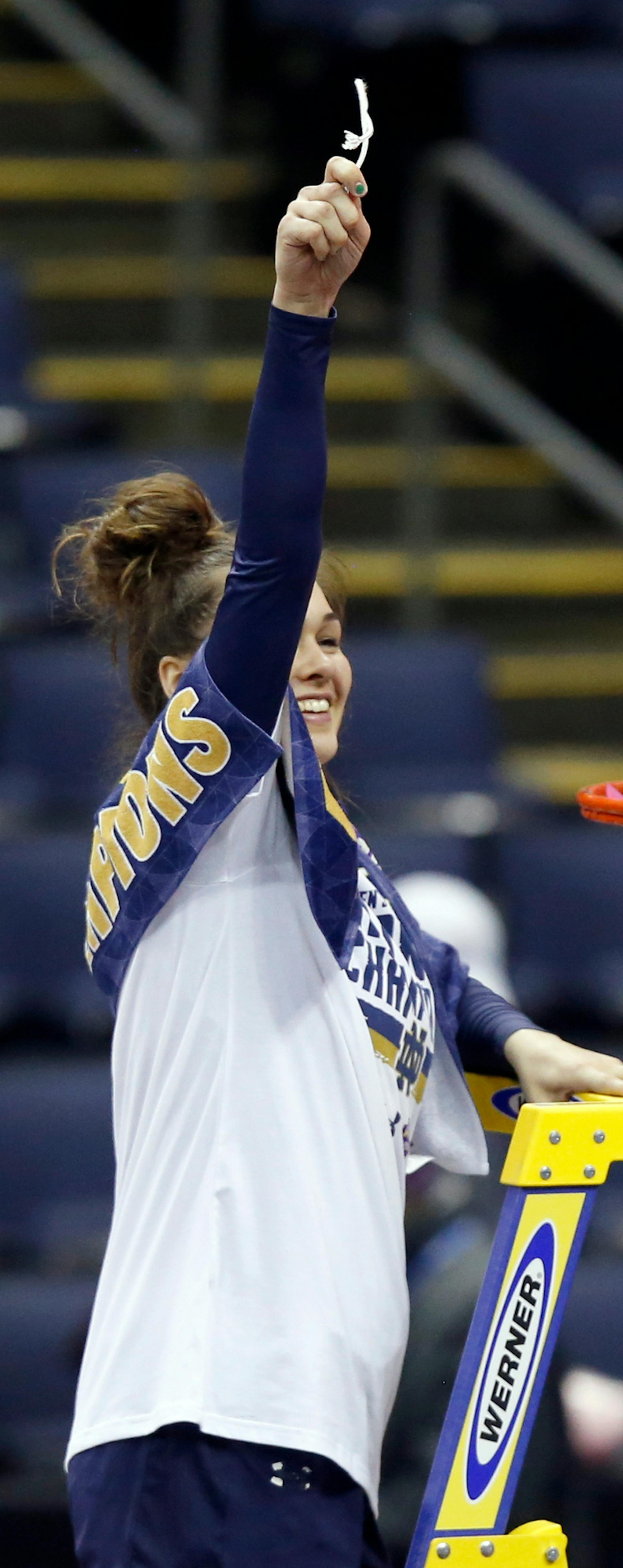 Notre Dame's Kathryn Westbeld celebrates by cutting down the net after defeating Mississippi State in the final of the women's NCAA Final Four college basketball tournament, Sunday, April 1, 2018, in Columbus, Ohio. Notre Dame won 61-58.