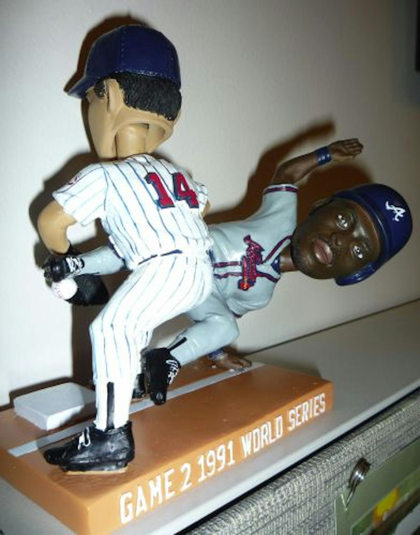 The leg lift bobblehead